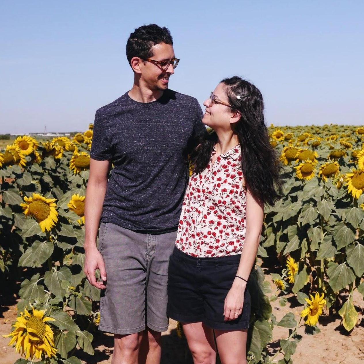Celebrating our engagement in a field of sunflowers!