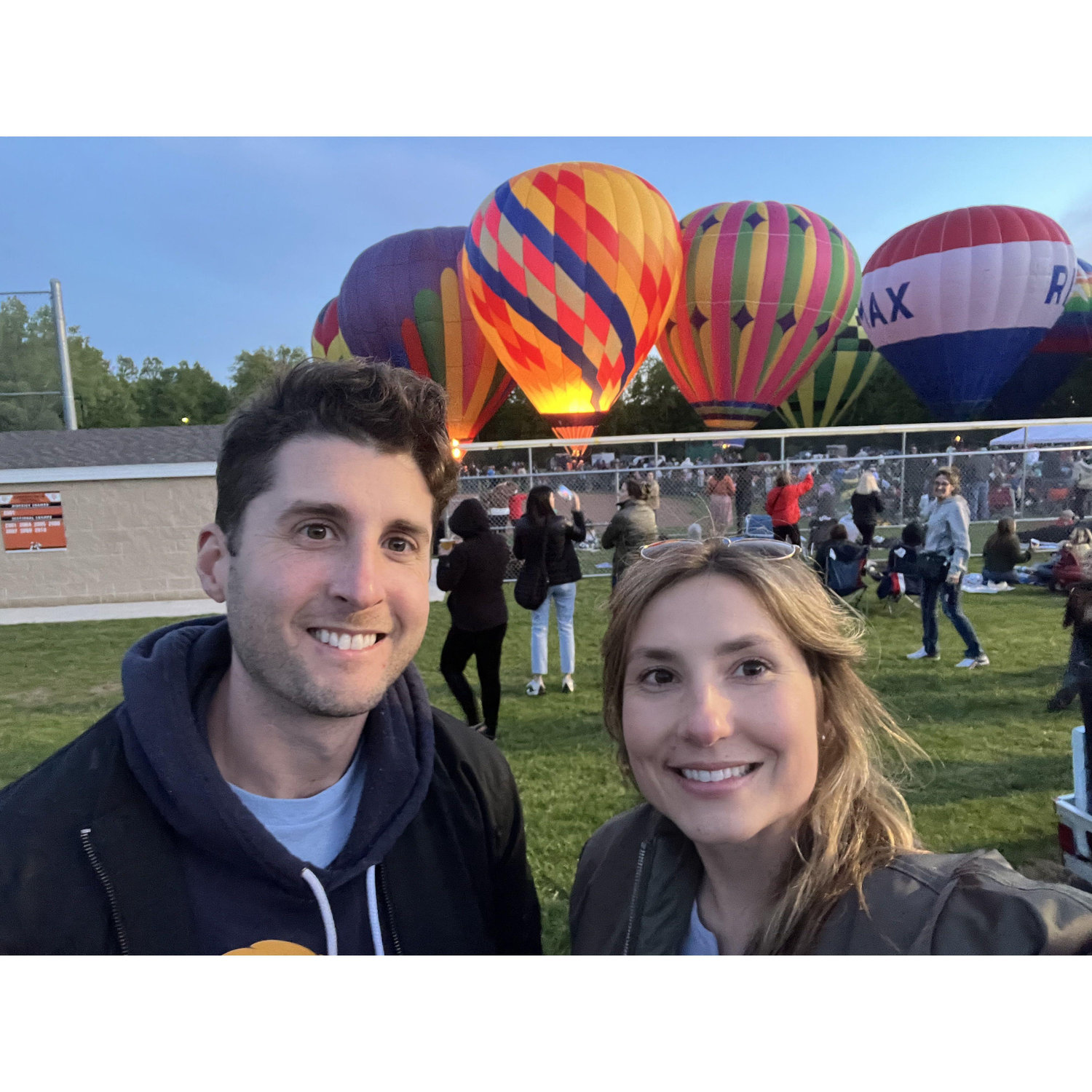 At the Chagrin Falls Blossom Time festival watching to balloon glow.