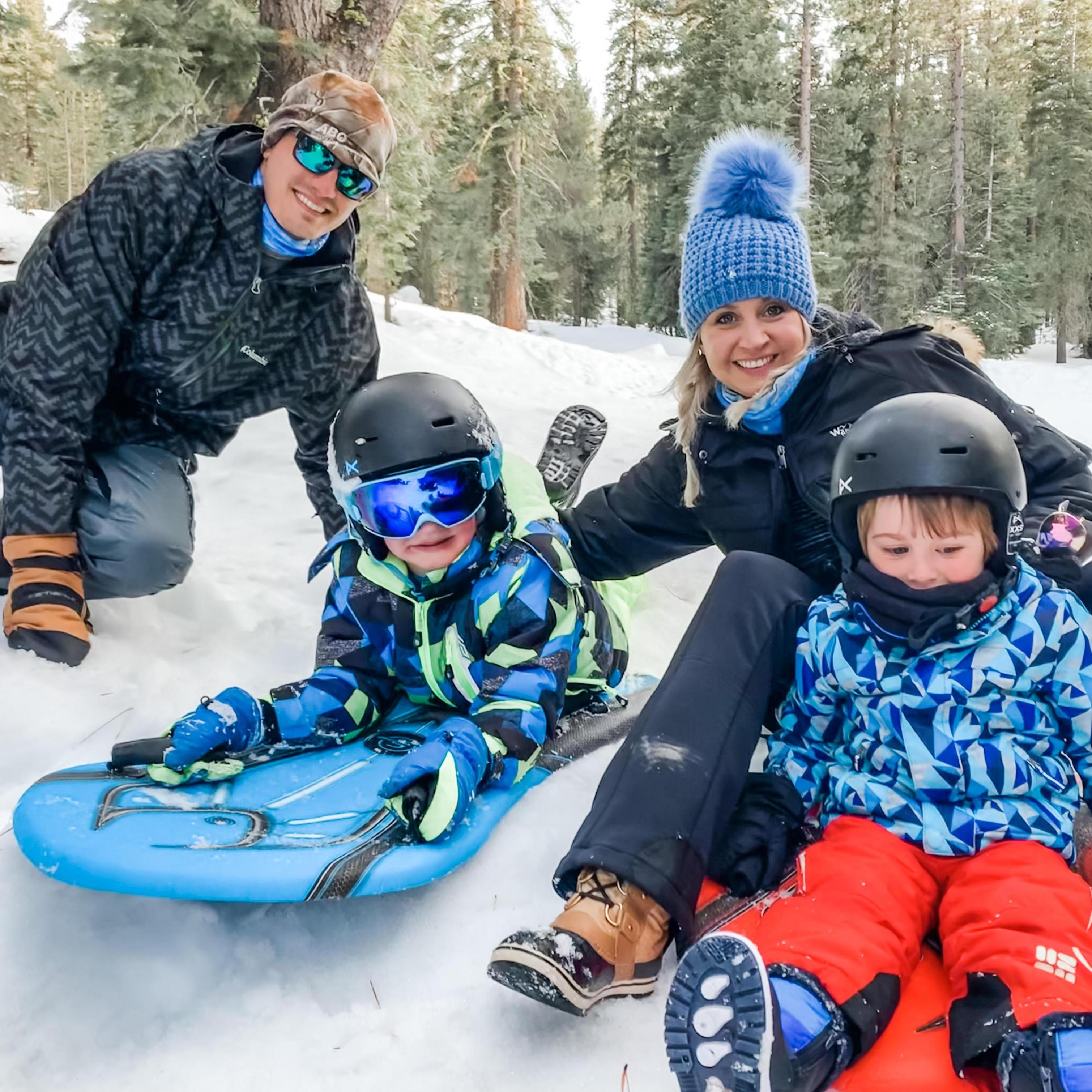 Sledding with the boys in Lake Tahoe (Colton on the blue board and Liam on the red)
