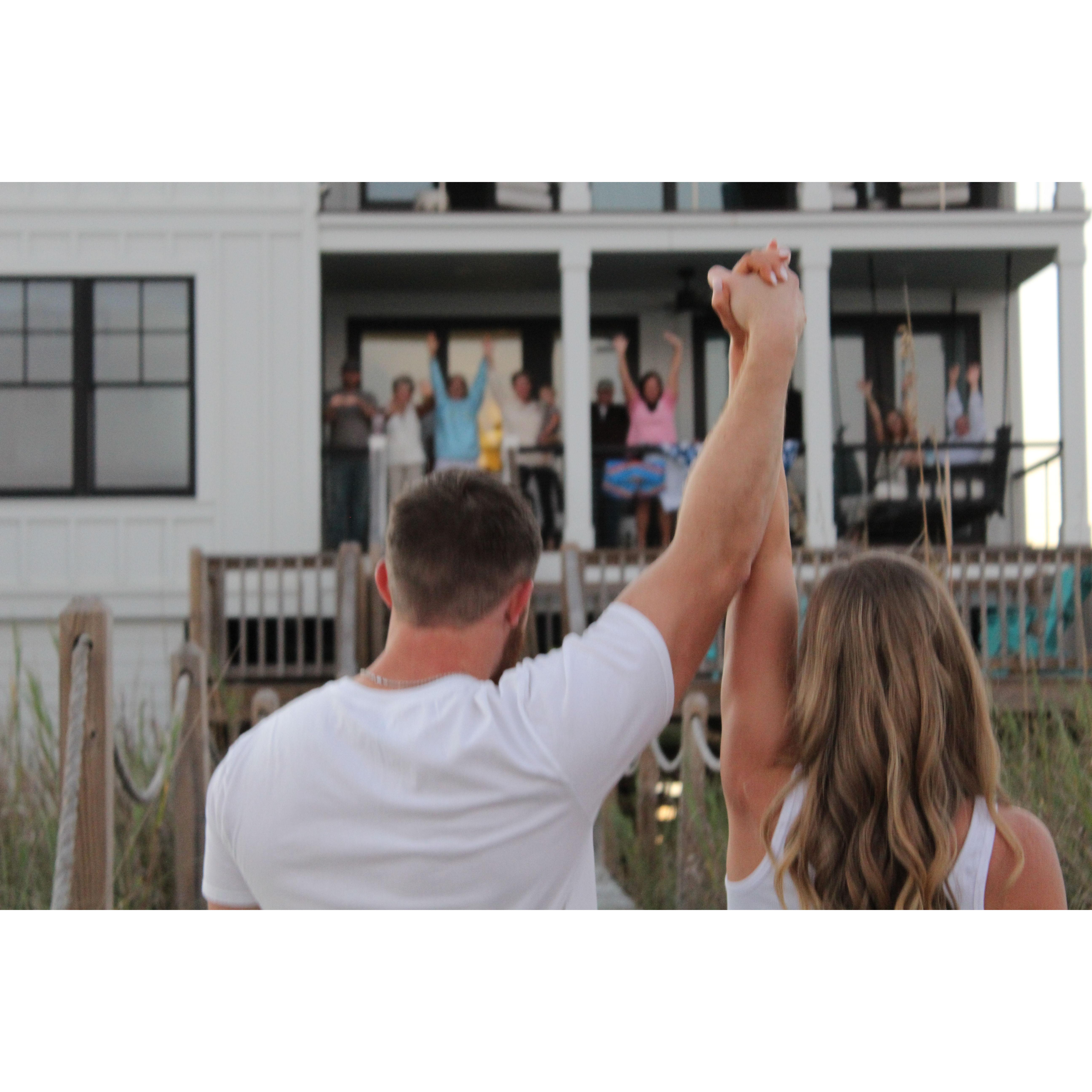 After the sweetest proposal and photoshoot, Gavin's entire family was on the back porch ready to greet and congratulate the newly engaged couple!