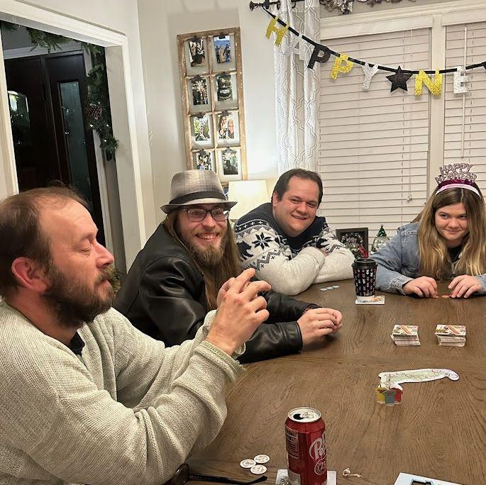 New Years Eve at Jenn Deese's house. Pictured: Chris Collier (father of the groom), Nathanael, Jacob, and Emily.