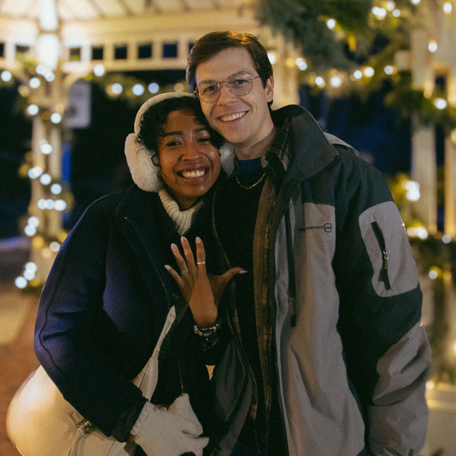 Jordan got his uncle to hide in a bush beside a gazebo in Downtown Grand Rapids to capture our special moment. Imagine Gabby's surprise when a man with a camera crawled out of a bush in the dark!