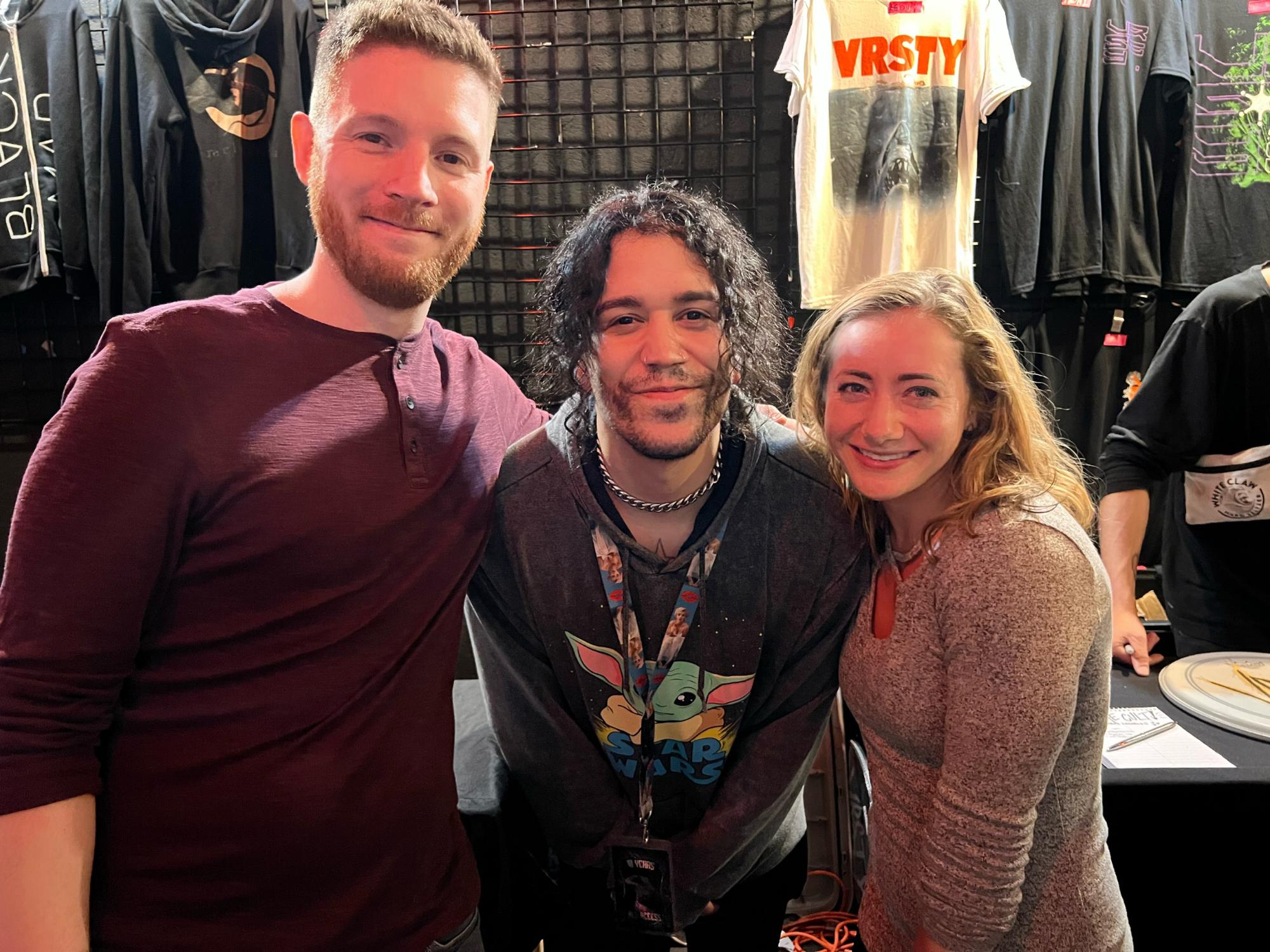 Photo of us with the lead singer of the band we saw after Josh proposed