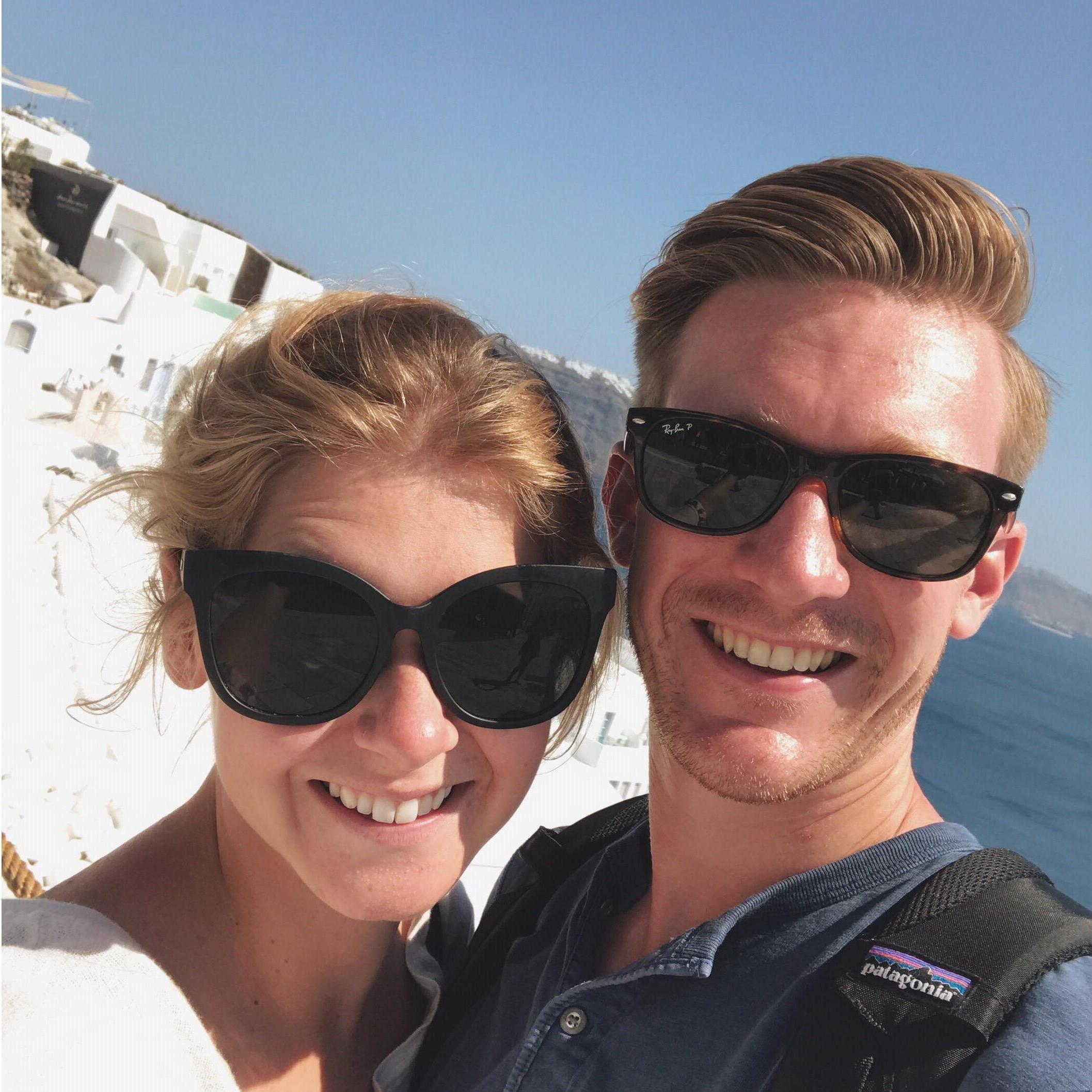 We weren't confident enough in our Greek to ask someone to take our photo, so we invite you to imagine the rest of the cliff-side in Santorini.