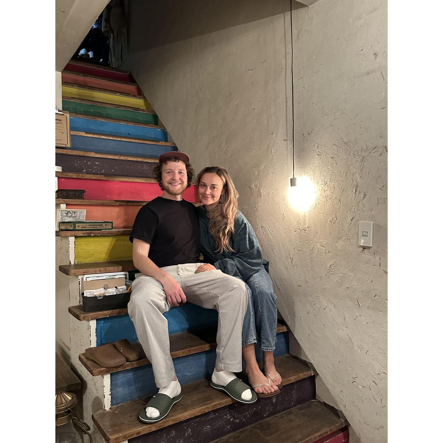 On the stairs of our hostel in Japan