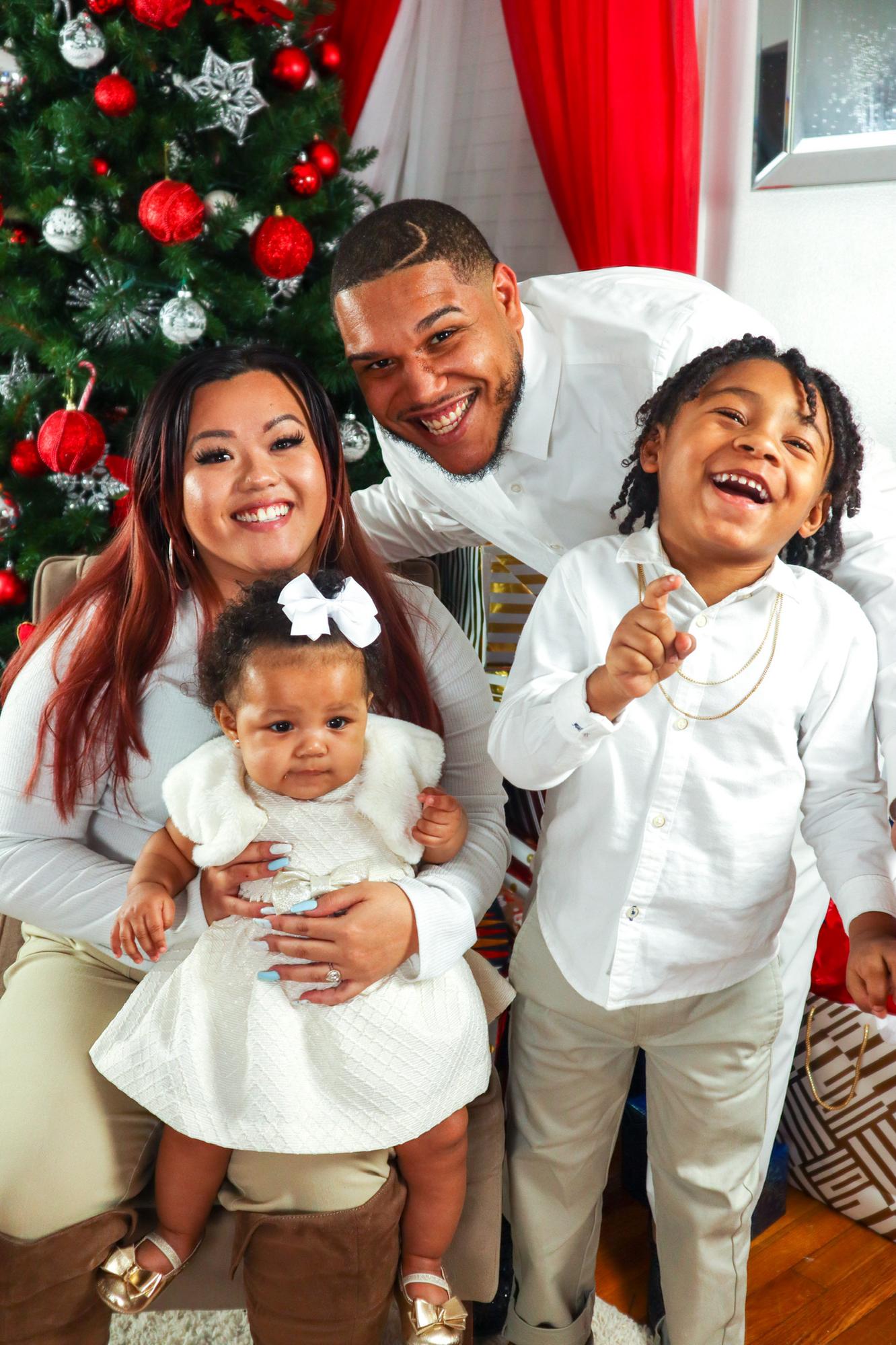 Our first Christmas picture with my god daughter/his niece & nephew.