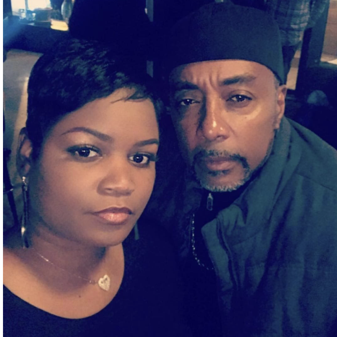 We were trying to smile with our eyes...I guess! lol