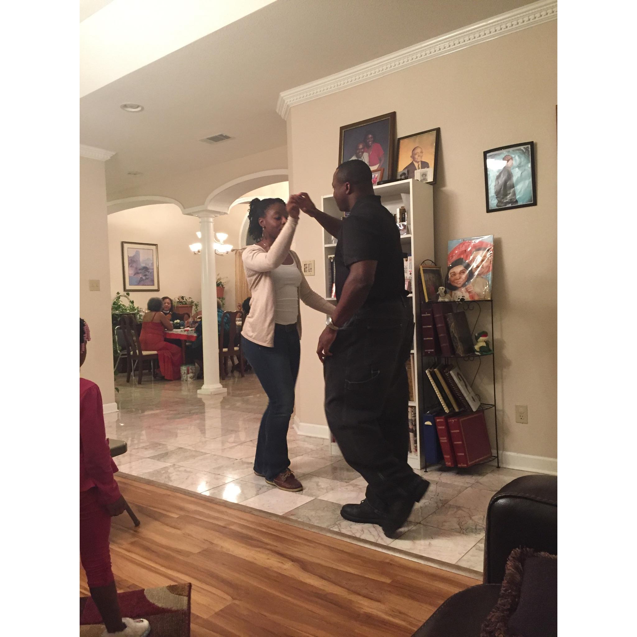 He's always trying to teach me something new on the dance floor- even at our first Christmas party together.