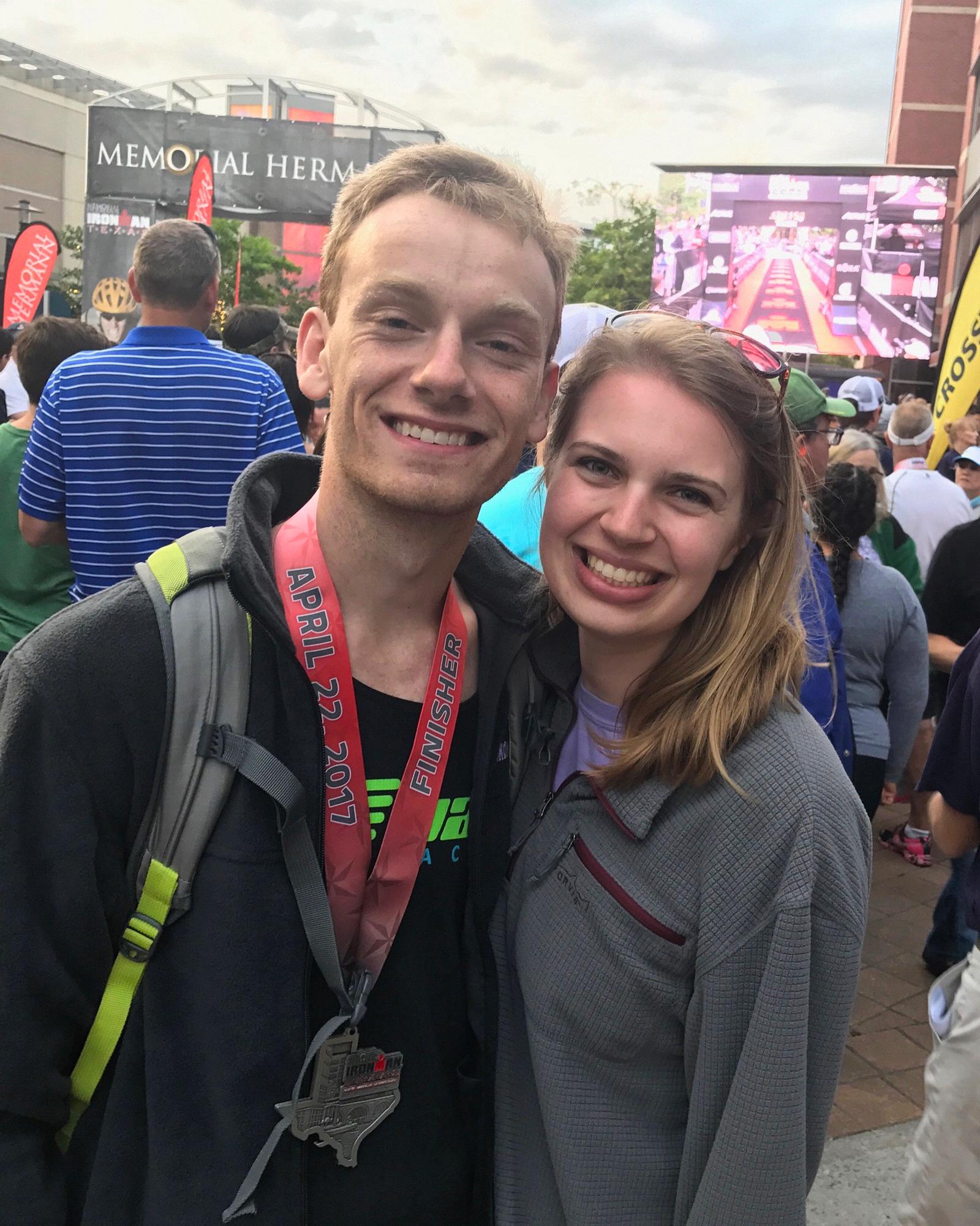 At the finish line of Connor’s Ironman triathlon