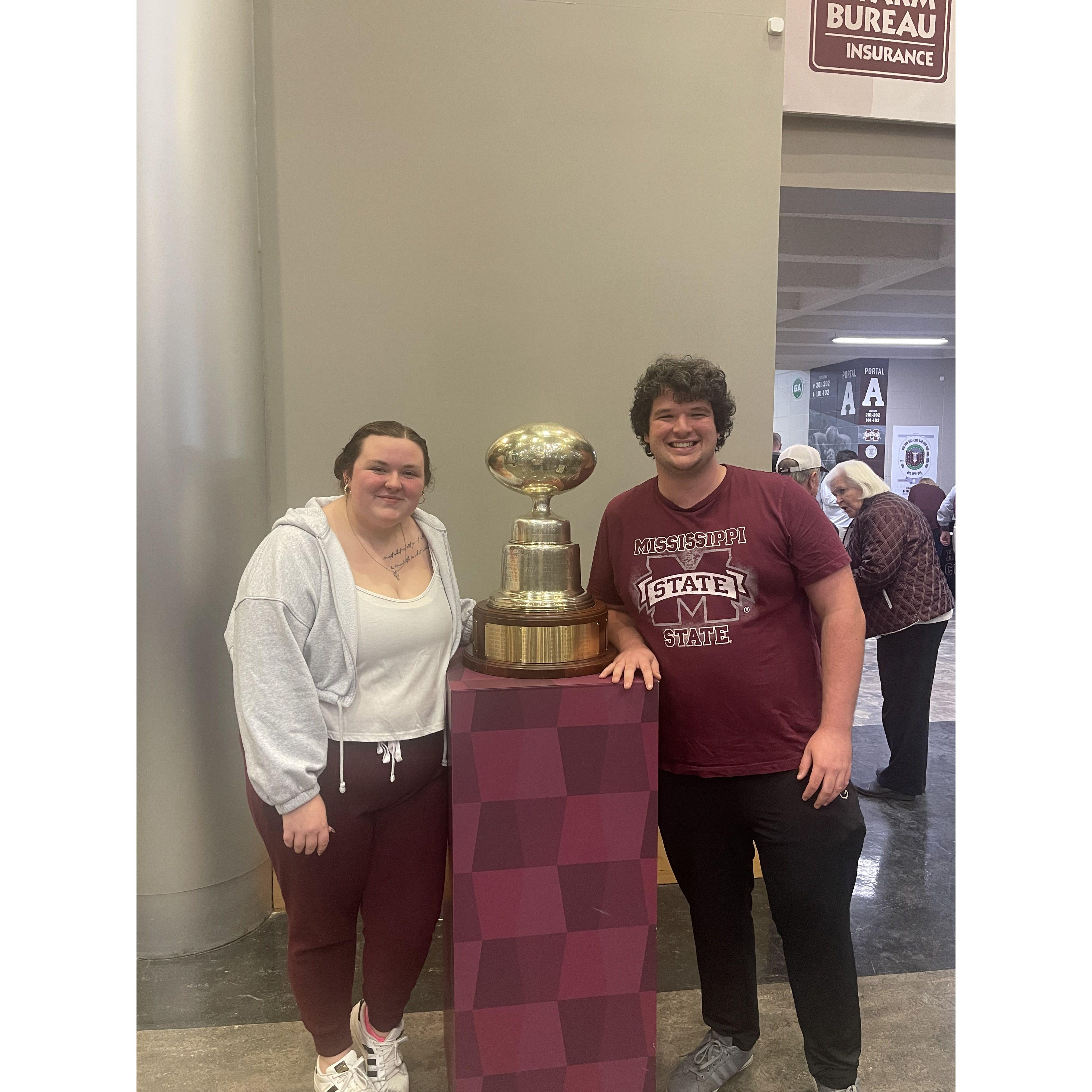 Basketball feat the egg bowl trophy