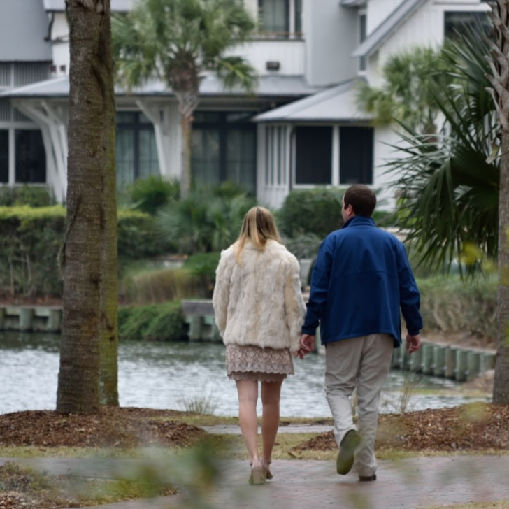 We are walking to the deck overlooking the water, where Sax is about to propose!