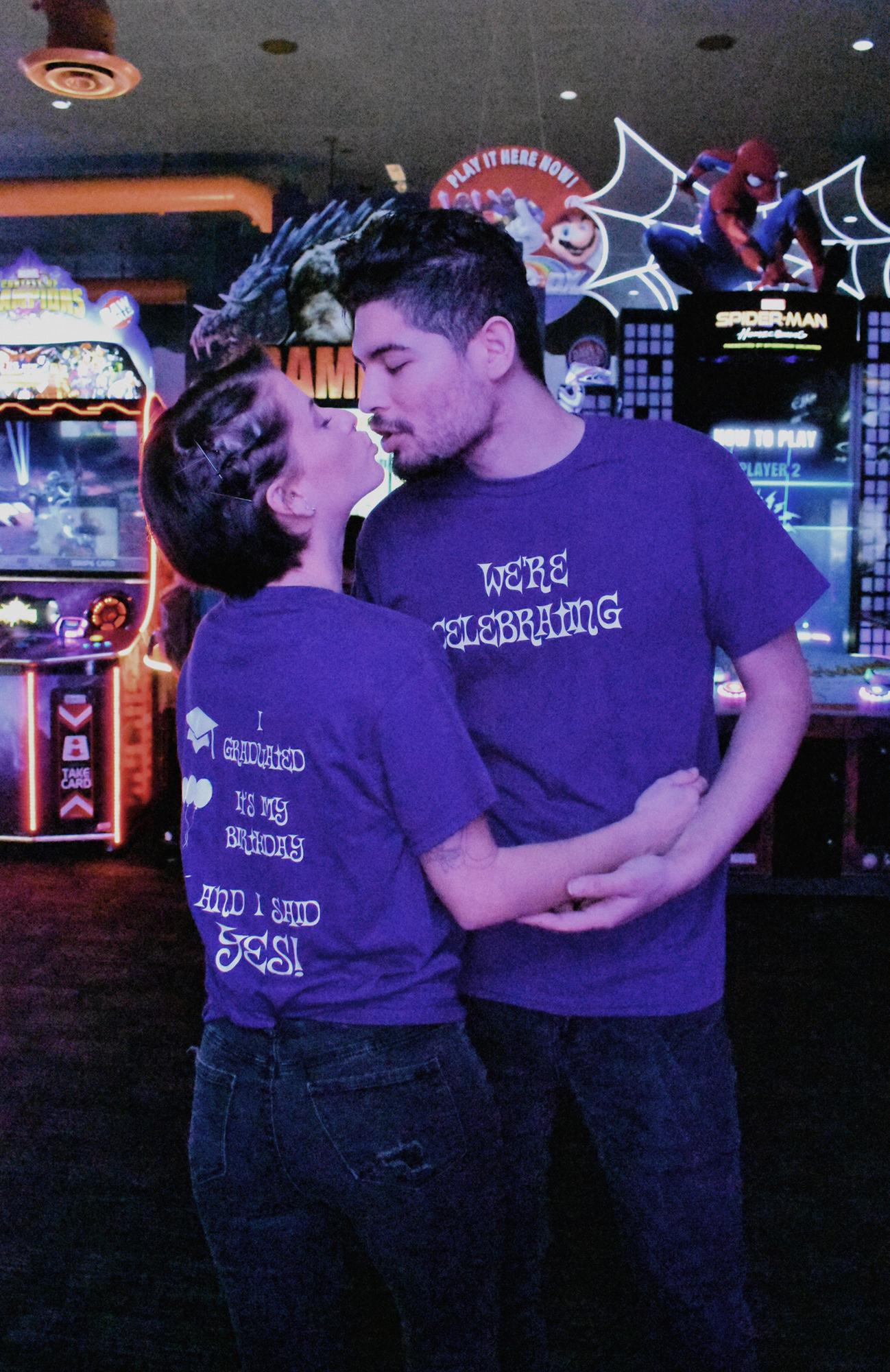 The couple at the engagement party wearing the tshirts Kristy’s mom had made.
