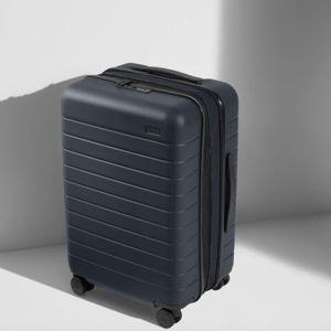 The Bigger Carry-On Flex in Navy Blue