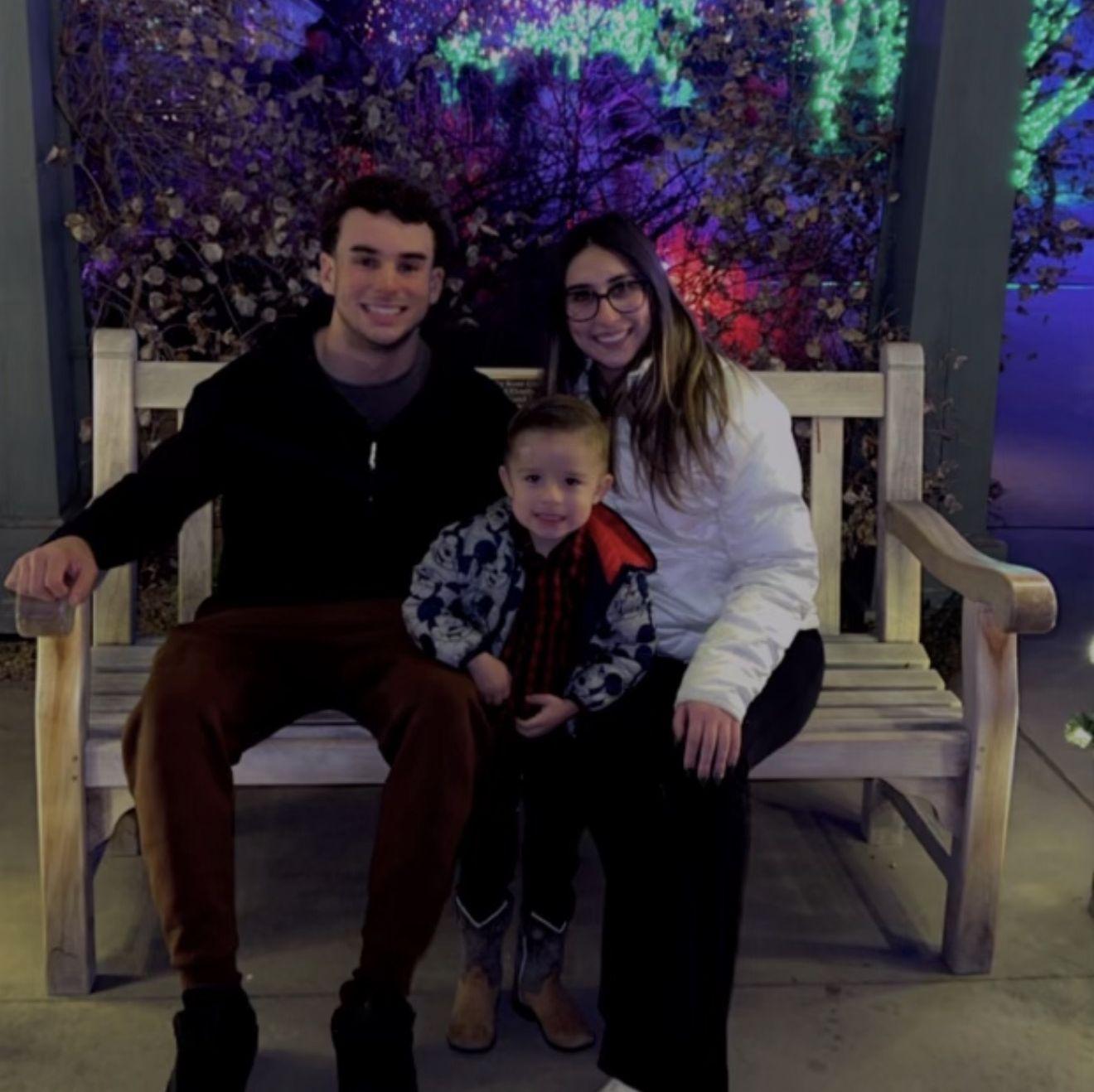 Christmas lights at the Denver Botanic Gardens with baby Eric—so magical we almost forgot it was freezing 🎄✨