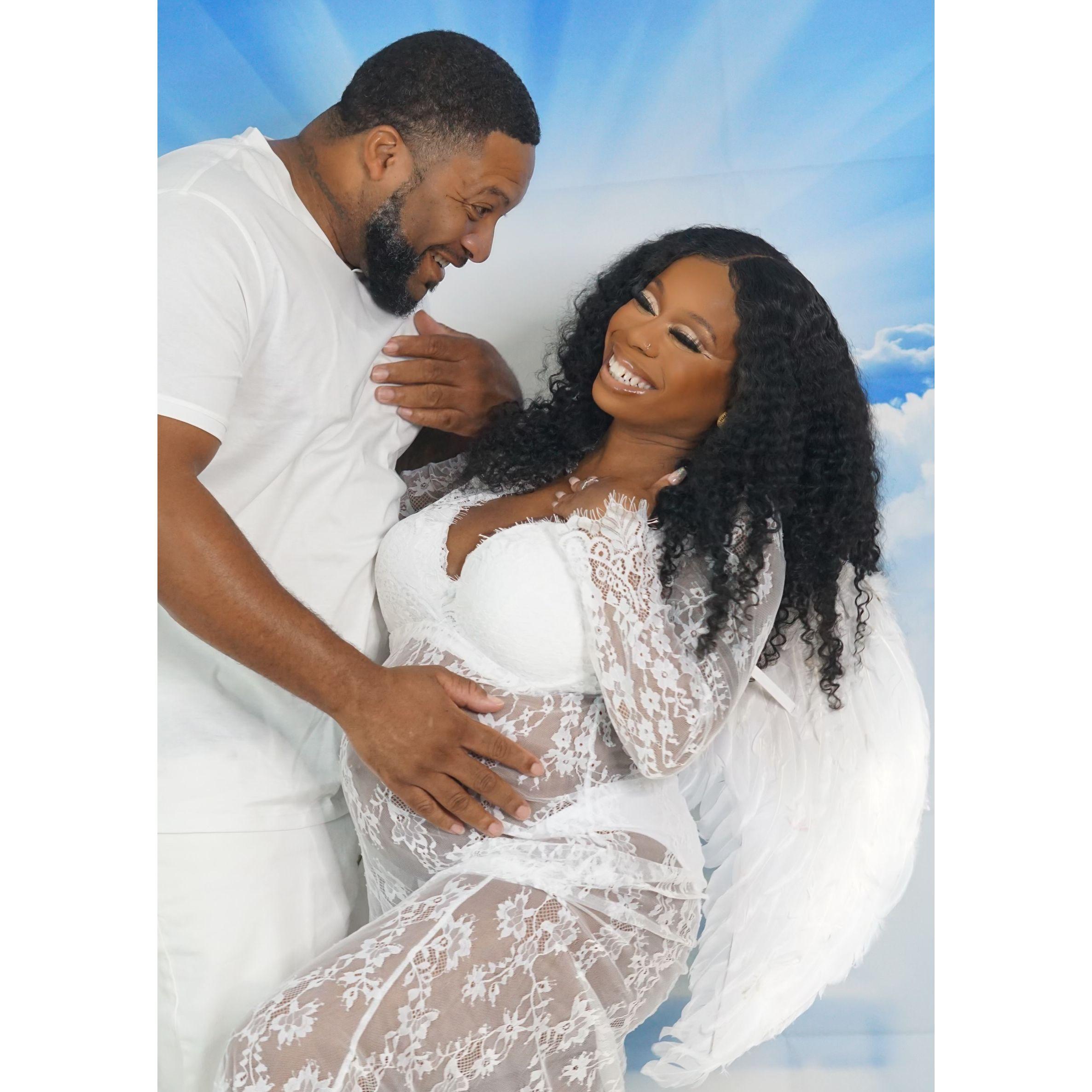 Laughing during our pregnancy photoshoot