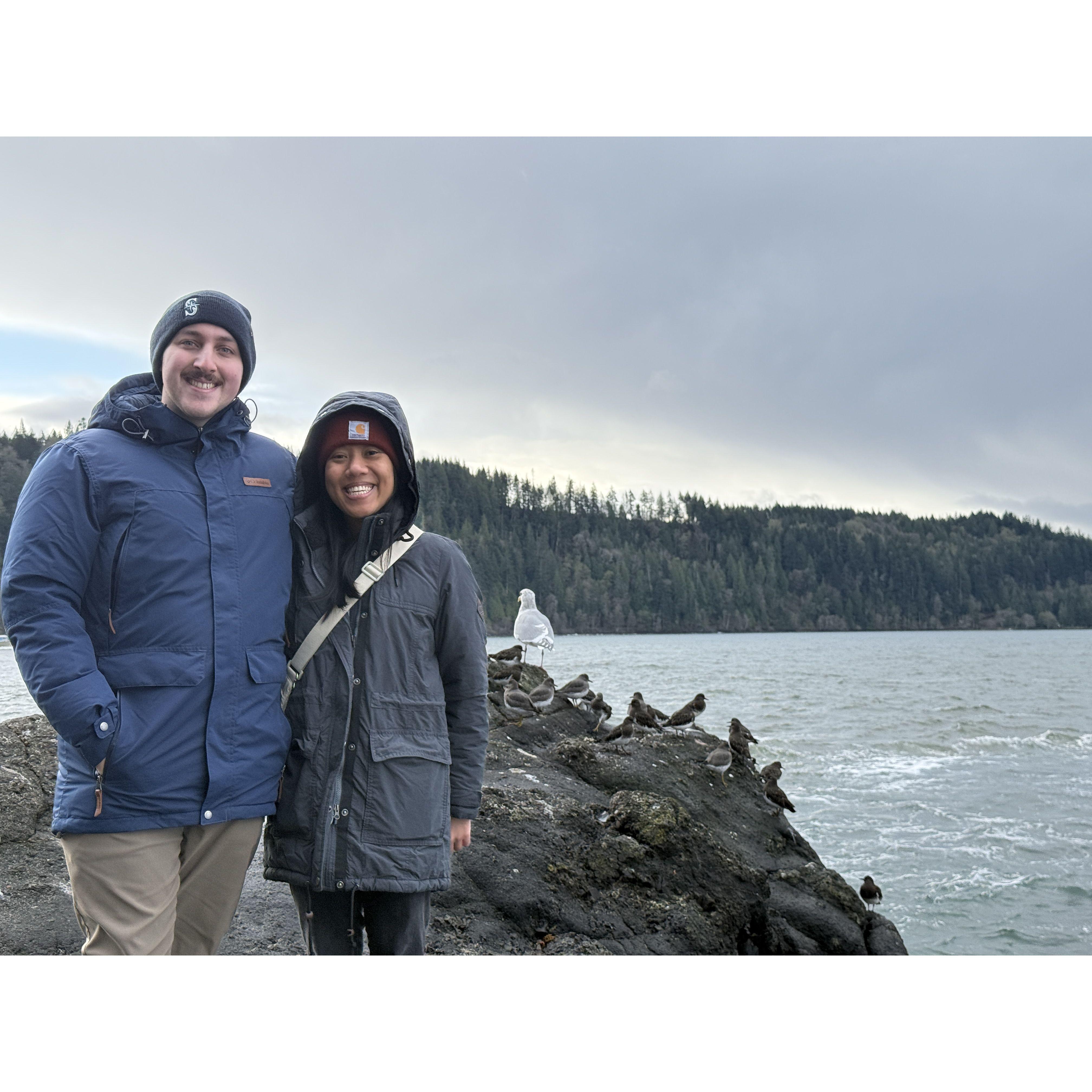 Who knew that a few months later, on November 11th, 2021, Seth asked Shanae on a date. *We went to a tide pool in Port Angeles, WA and got this photo with a few photobombers behind us.* 11-18-24