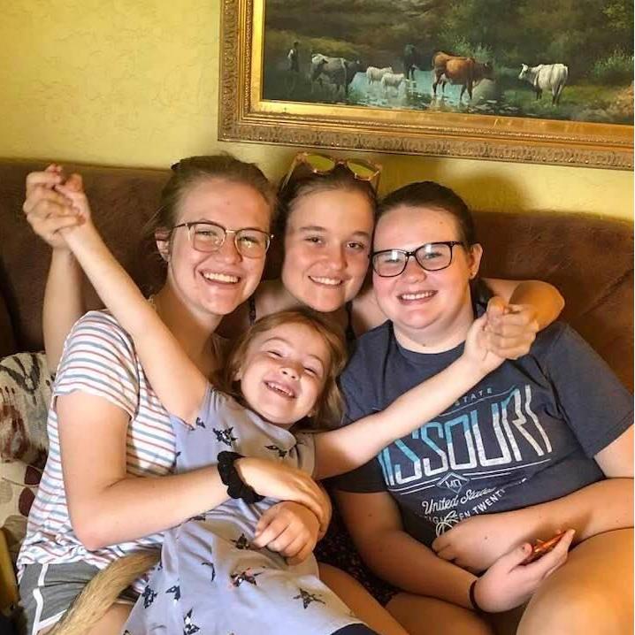 Della, cousin Adeline, Lila, and Alice (front).