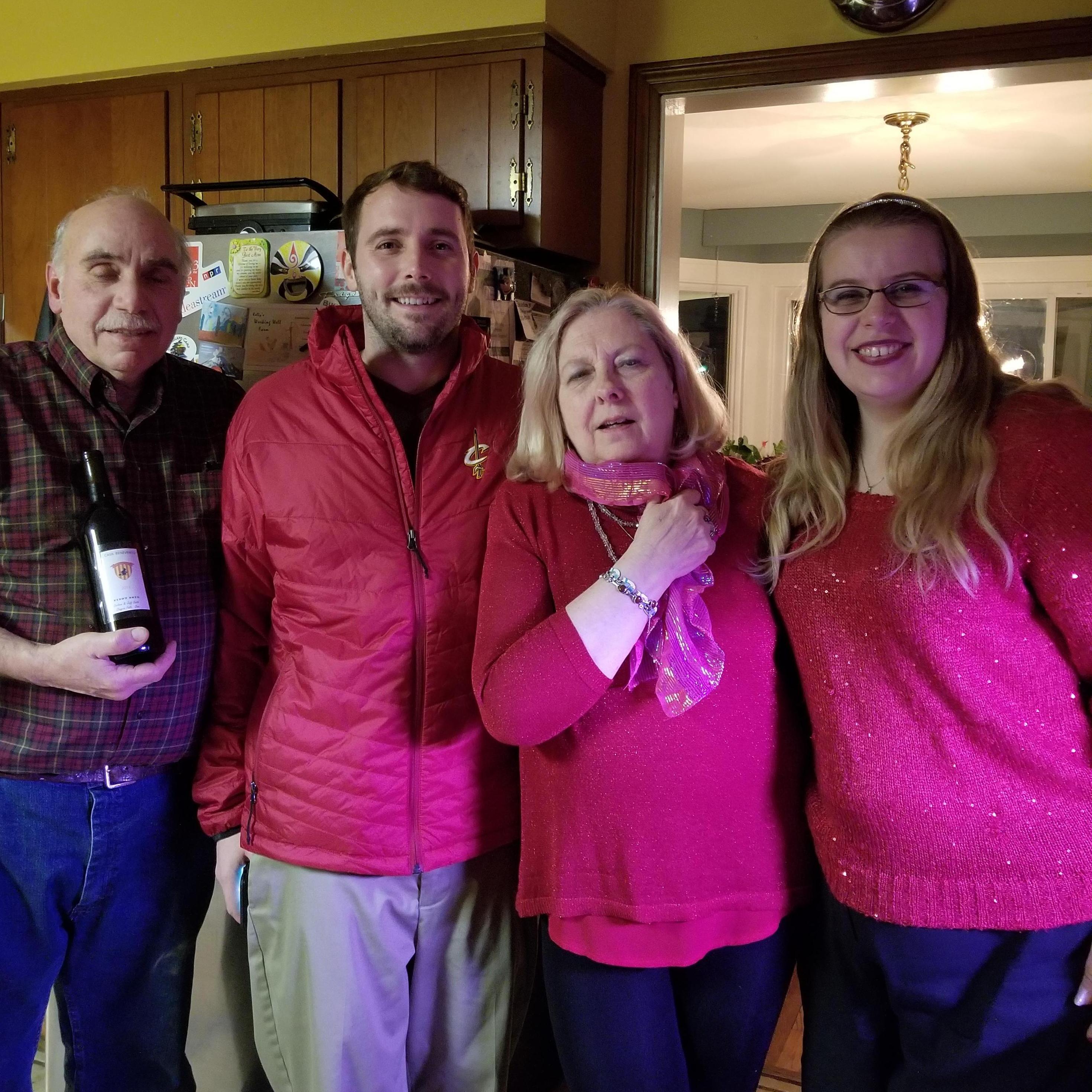 Melissa's family ask wearing red for Christmas! (Dad, Mike, Mom and I.)