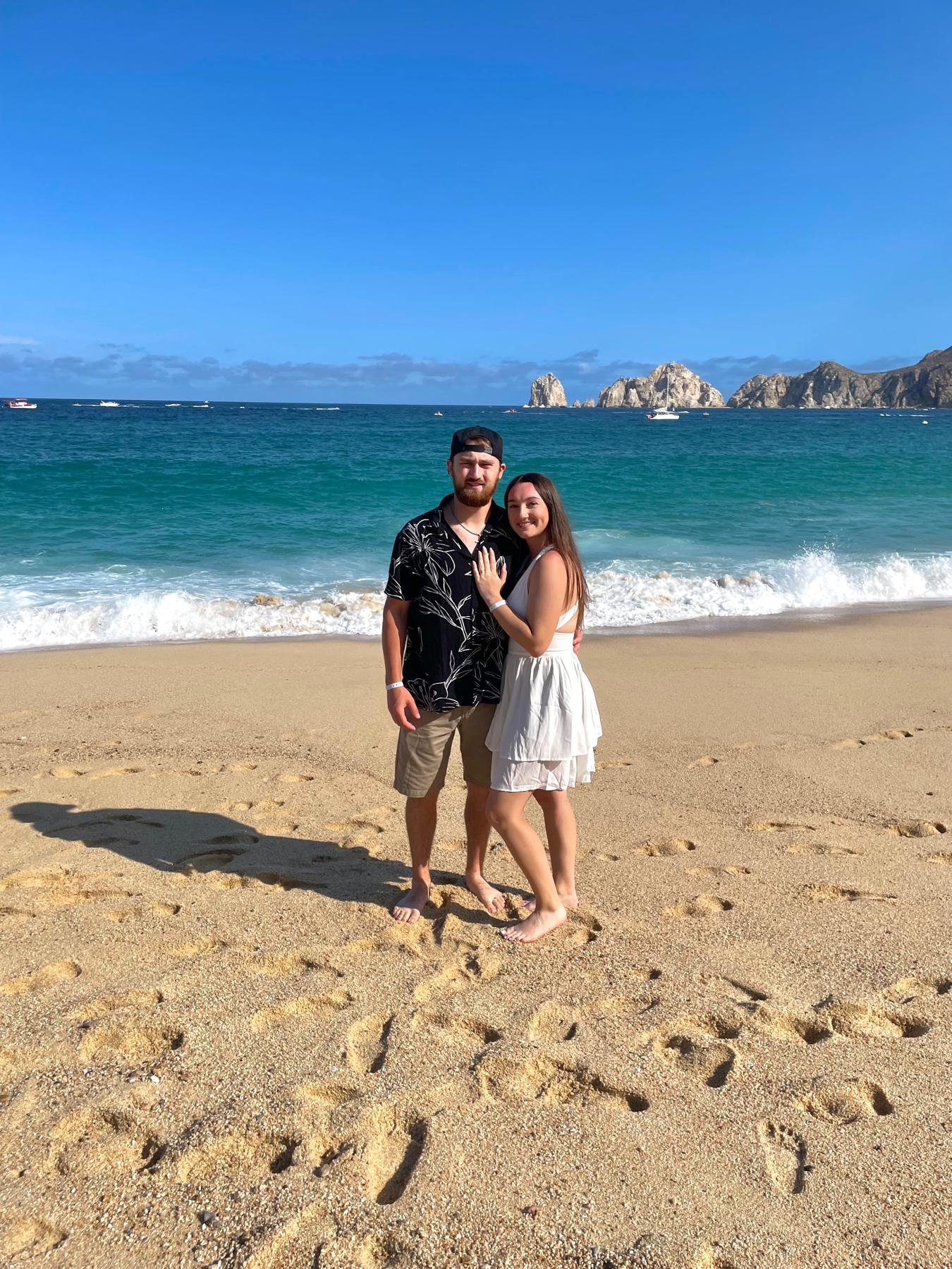 was supposed to be our save the date photo but it was a bit sunny on the beach🏝️