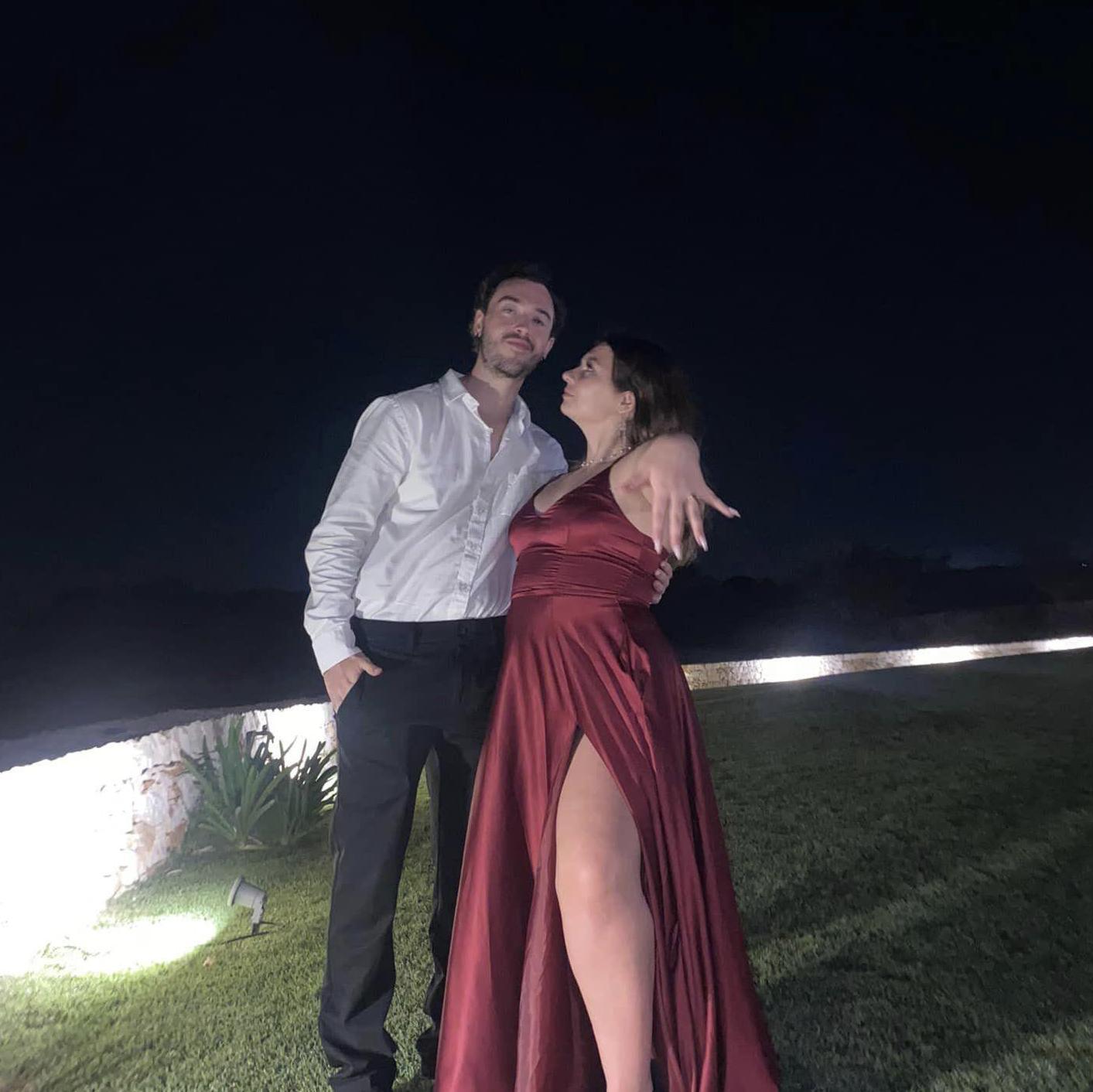 The night after the bride and groom got engaged while attending the brides cousins wedding!