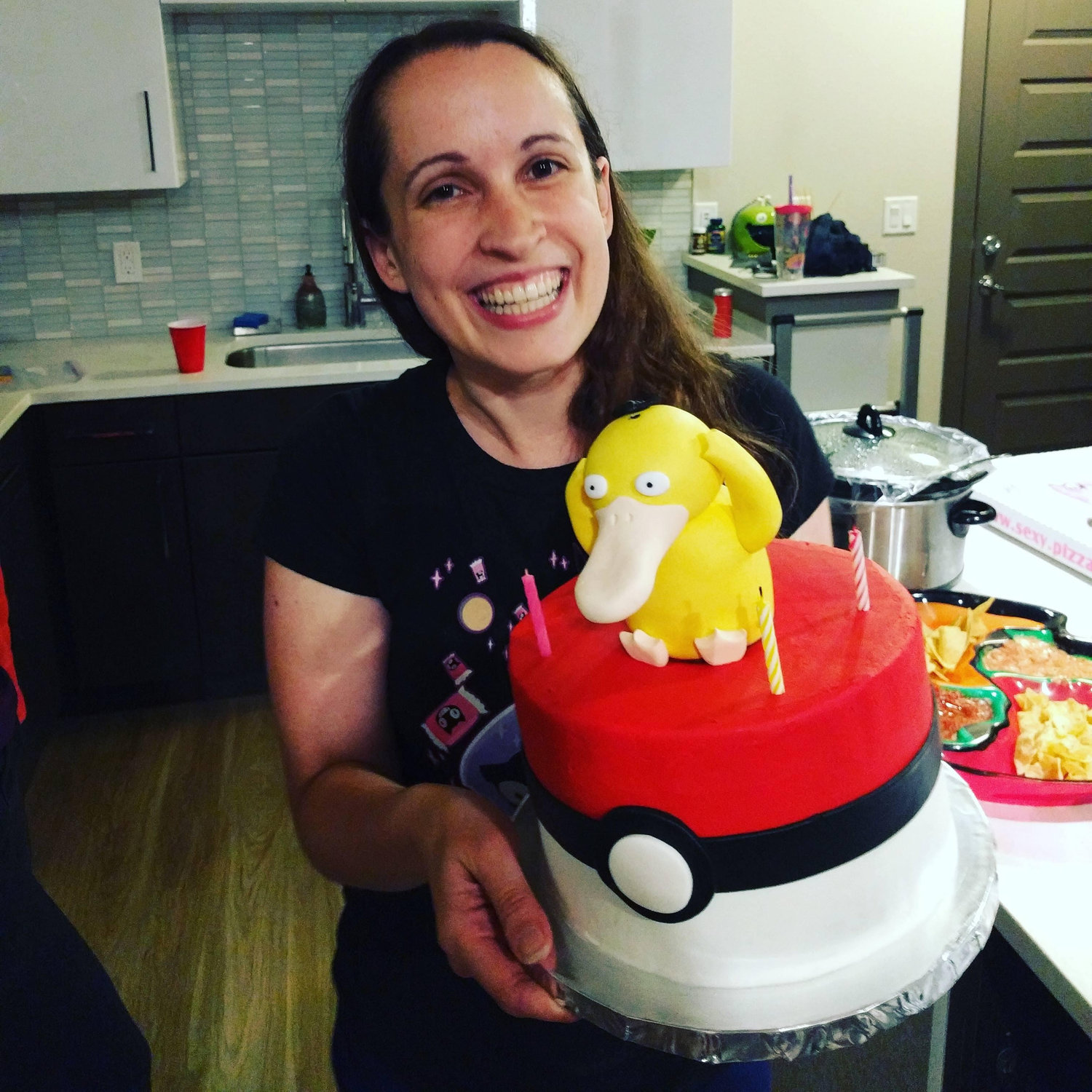 KC got Monica a Psyduck (the best Pokémon) cake for her birthday!
