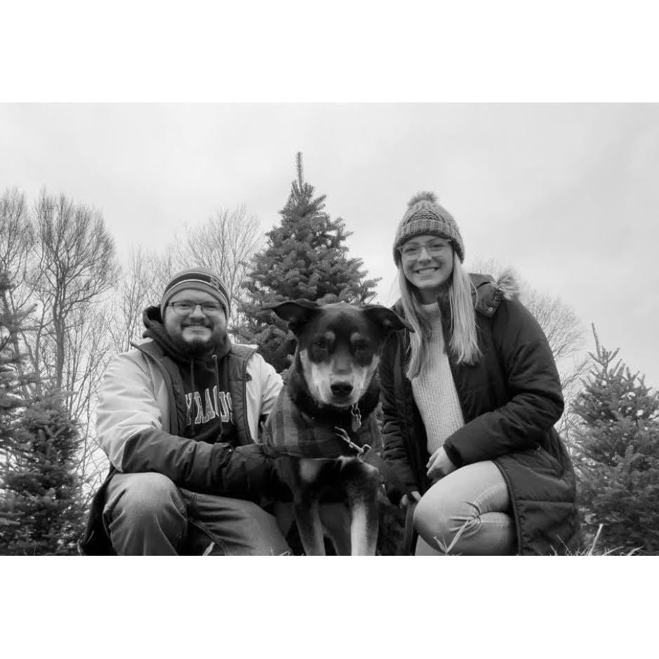 In an attempt to take our Christmas card photo, we took about 3,000 pictures trying to pose with Mosby haha.