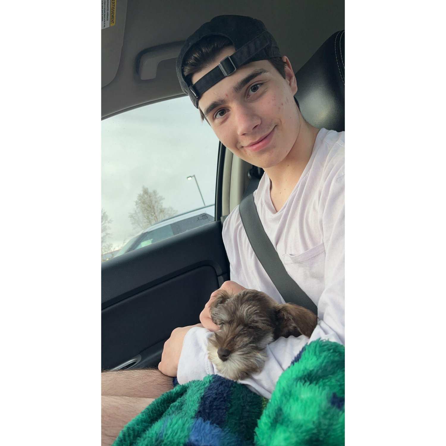 Before we graduated, we bought our dog Oliver. This was from the day we picked him up!