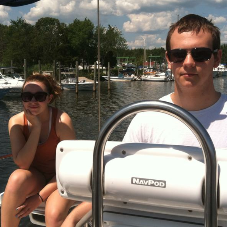The first time we went on my uncle's boat. He got to steer.
