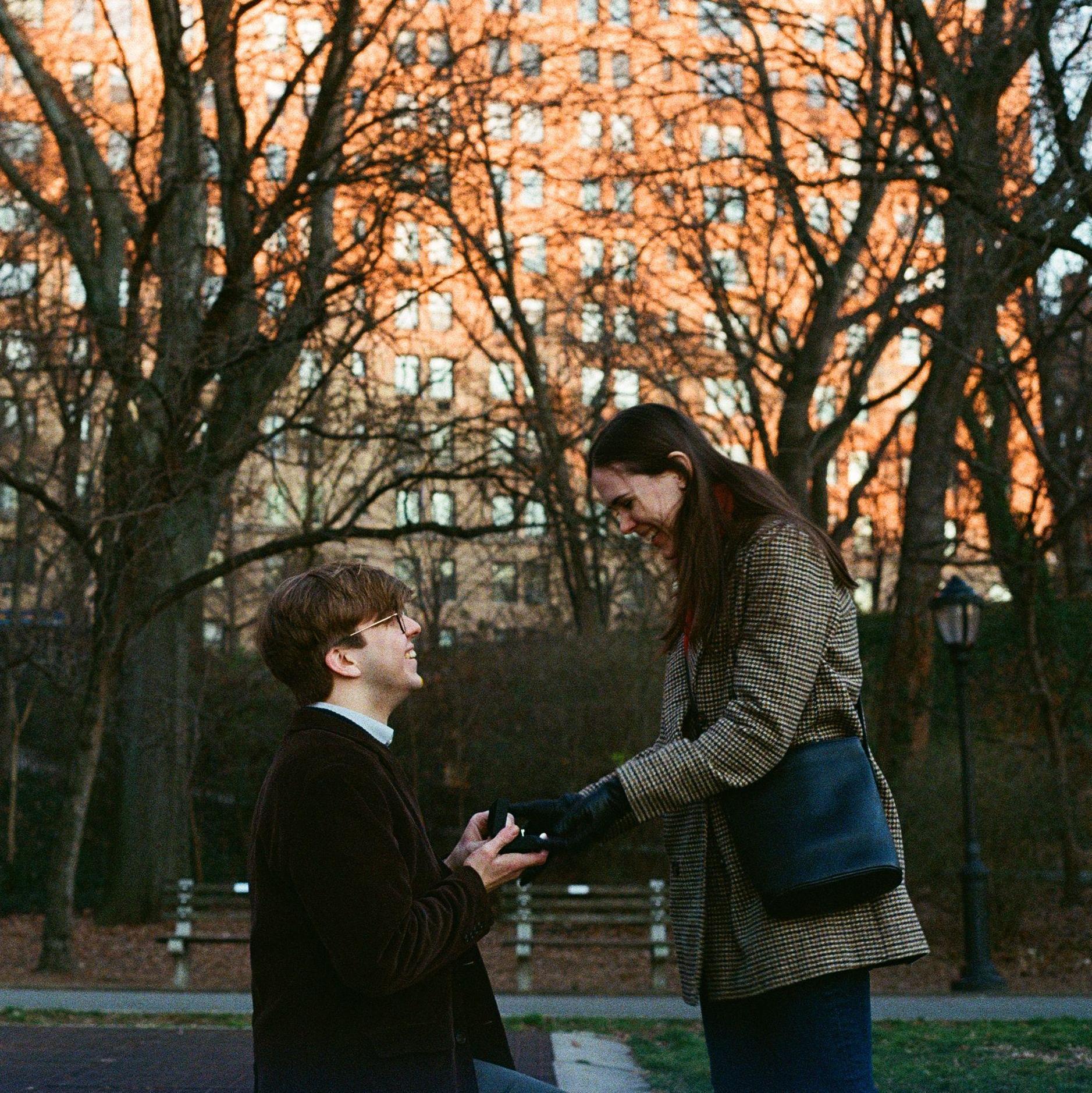 The photo of our engagement, I set the timer on the camera and quickly got down on one knee and proposed - Daniel