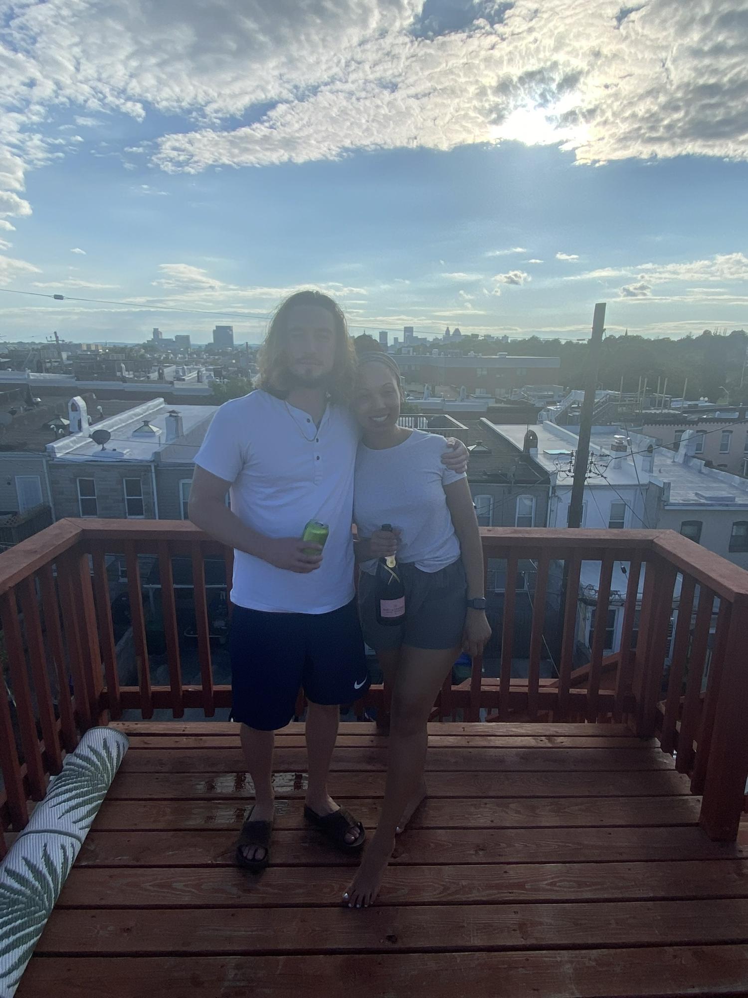 Popping champagne to celebrate moving in!