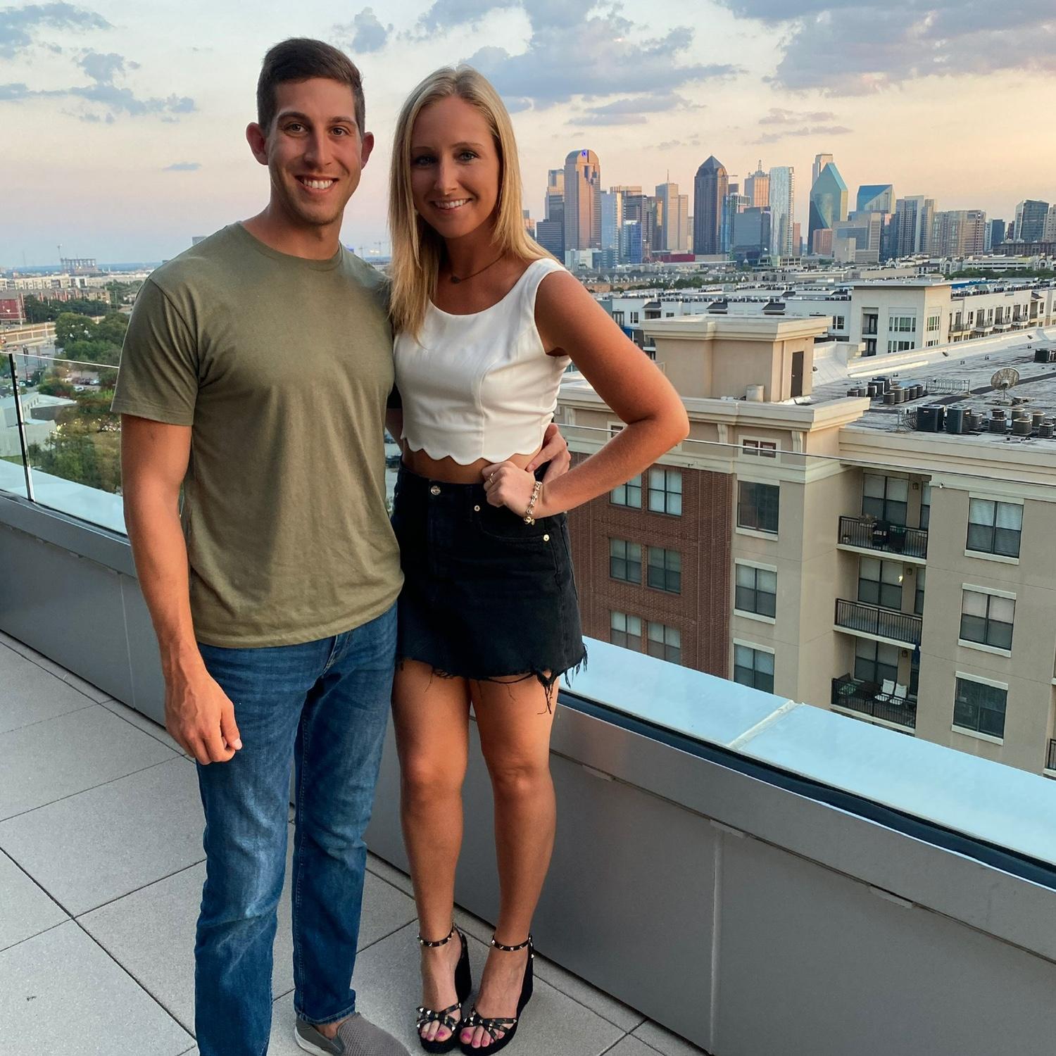 Our first ever photo together! One of our first date nights at a favorite rooftop bar in Dallas