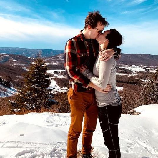 A snowy mountaintop was the perfect place to get engaged.