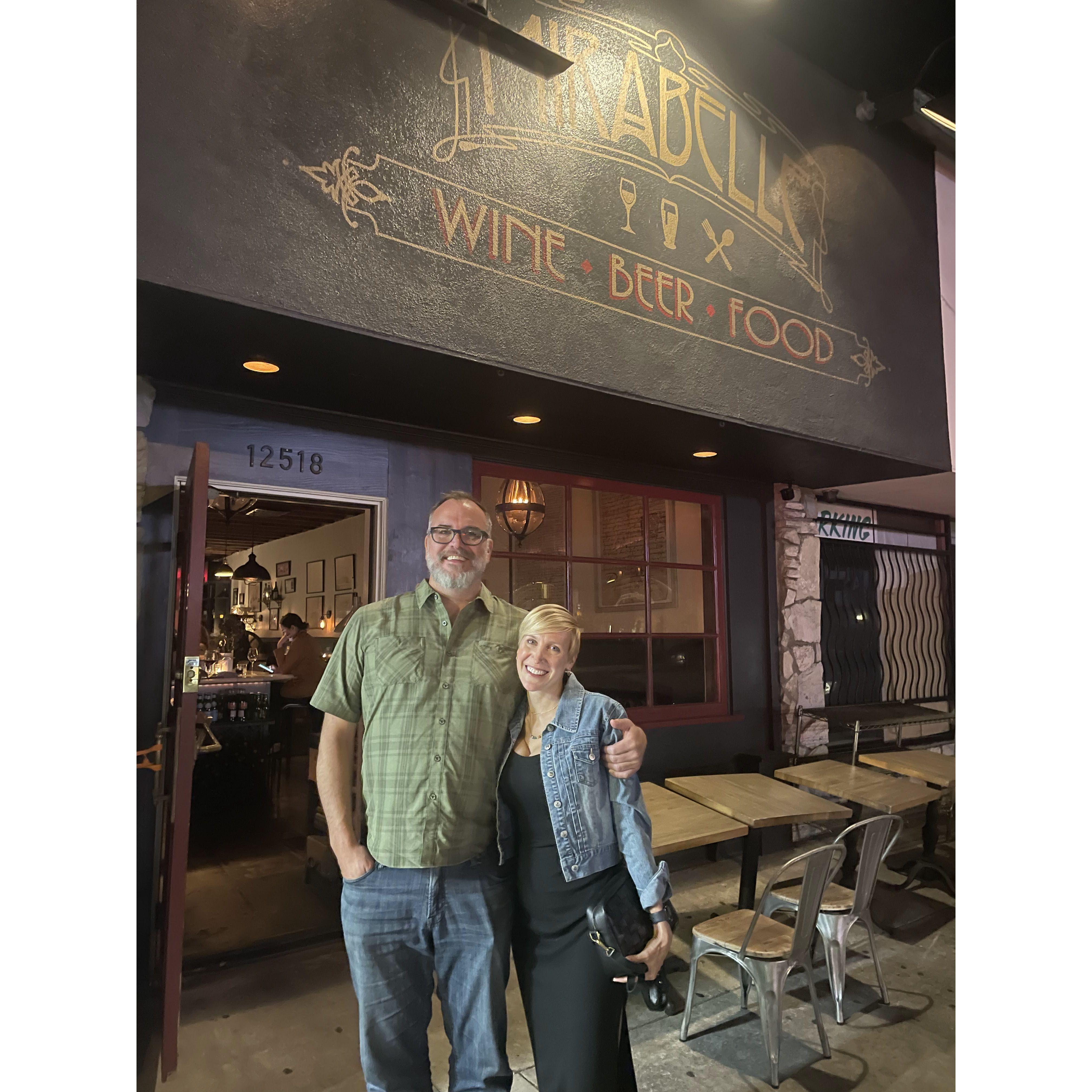 Us in front of the wine bar where we first met in 2019! We were smitten from day 1!