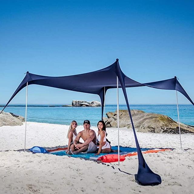 SUN NINJA Pop Up Beach Tent Sun Shelter UPF50+ with Sand Shovel, Ground Pegs and Stability Poles, Outdoor Shade for Camping Trips, Fishing, Backyard Fun or Picnics (10x10 FT 4 Pole, Navy)