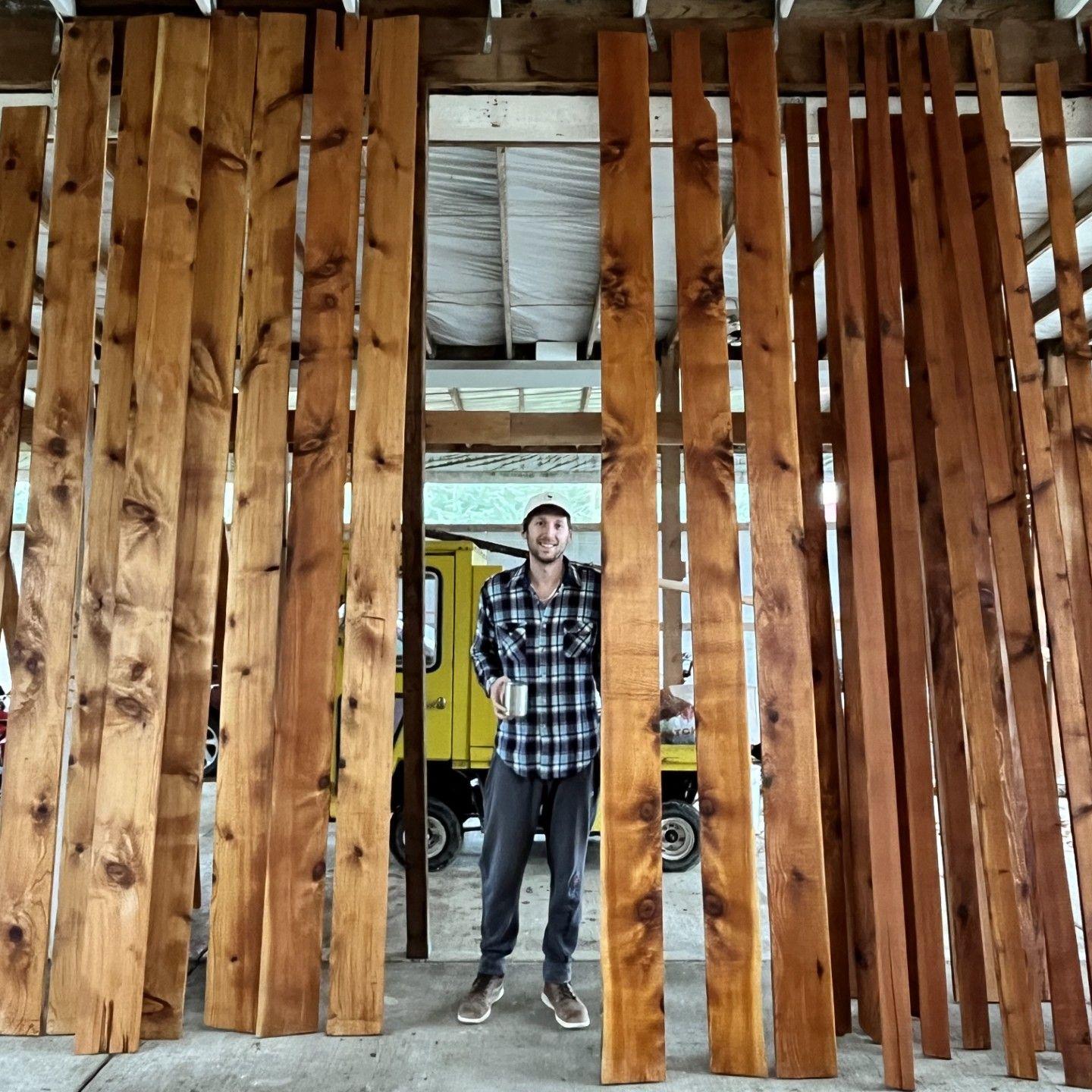 James stained all this beautiful cedar that we milled with Julia's parents, planed in the barn and now have as the siding for the entryway of our home.