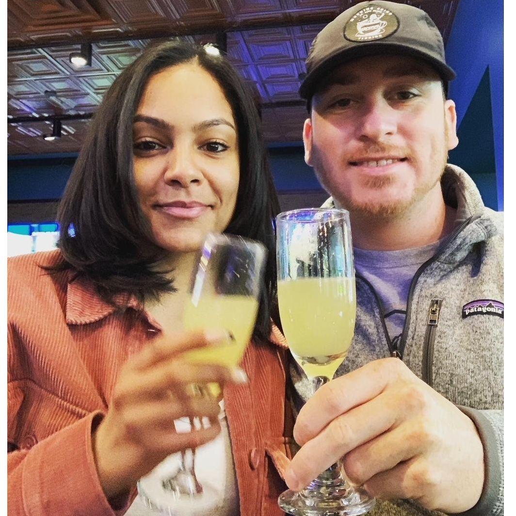 Airport mimosas to kick off our first trip post-deployment—California, here we come!