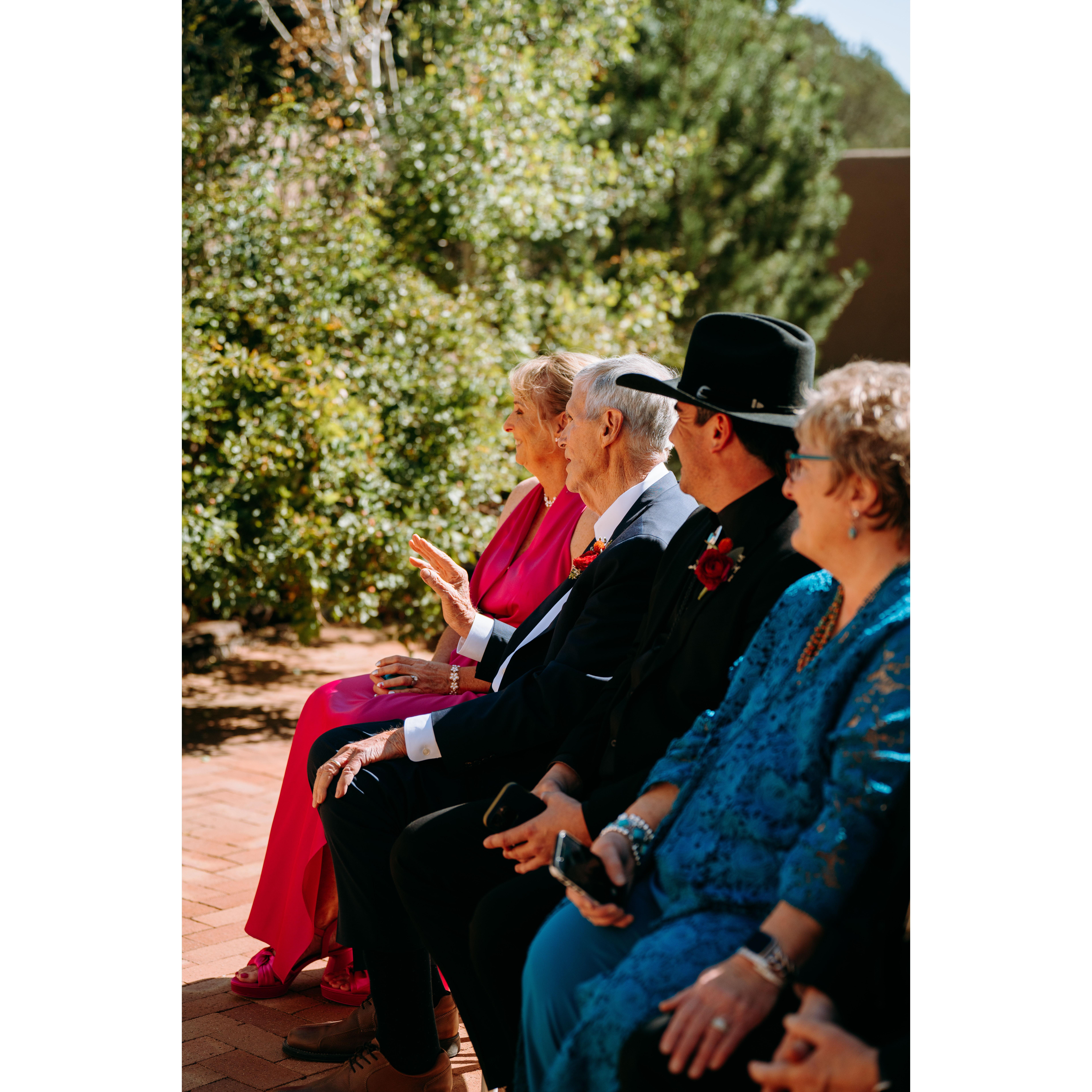 Debi, John, Will and Marla watch the vow ceremony