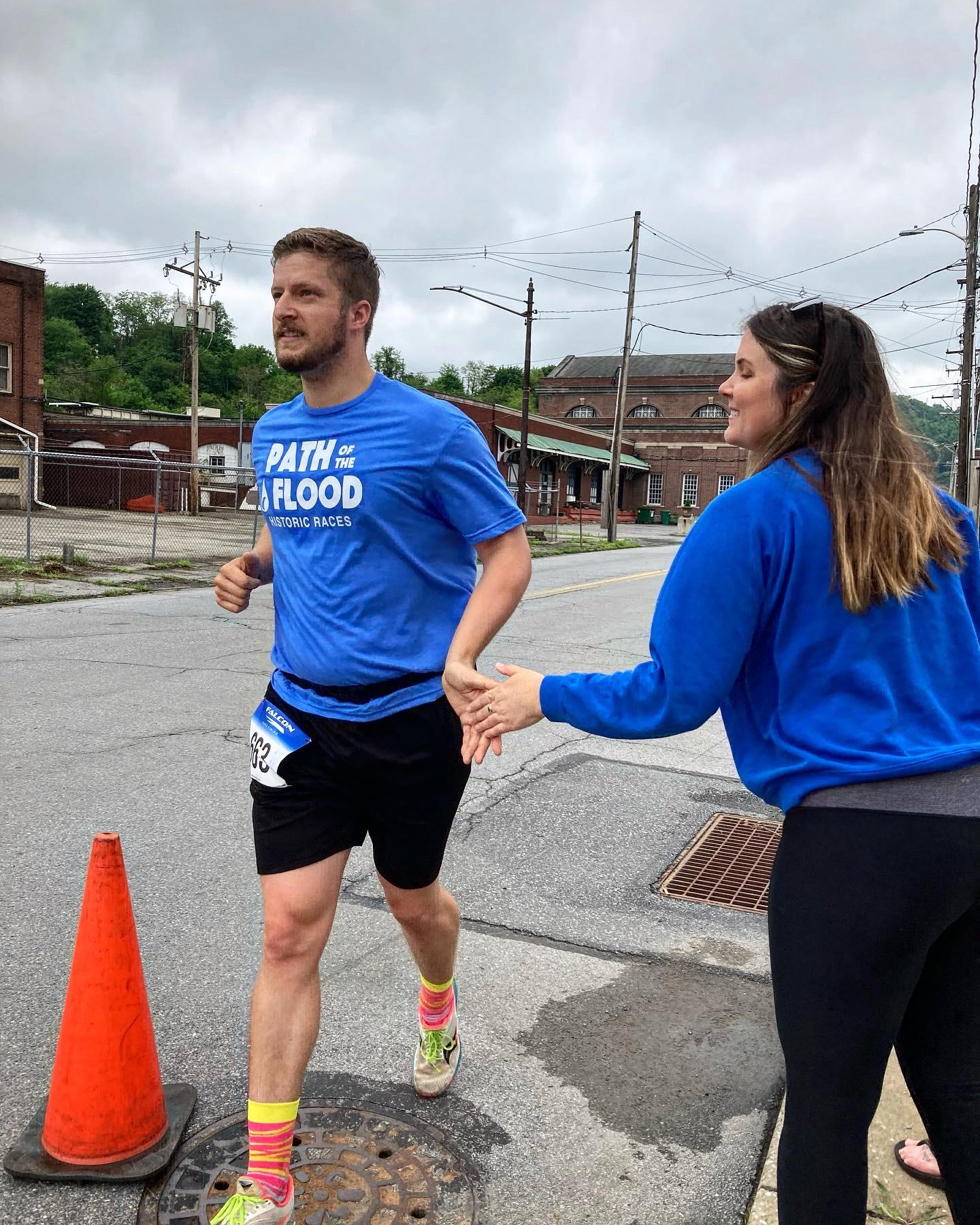 Eth finishes his first half marathon, May 2022.