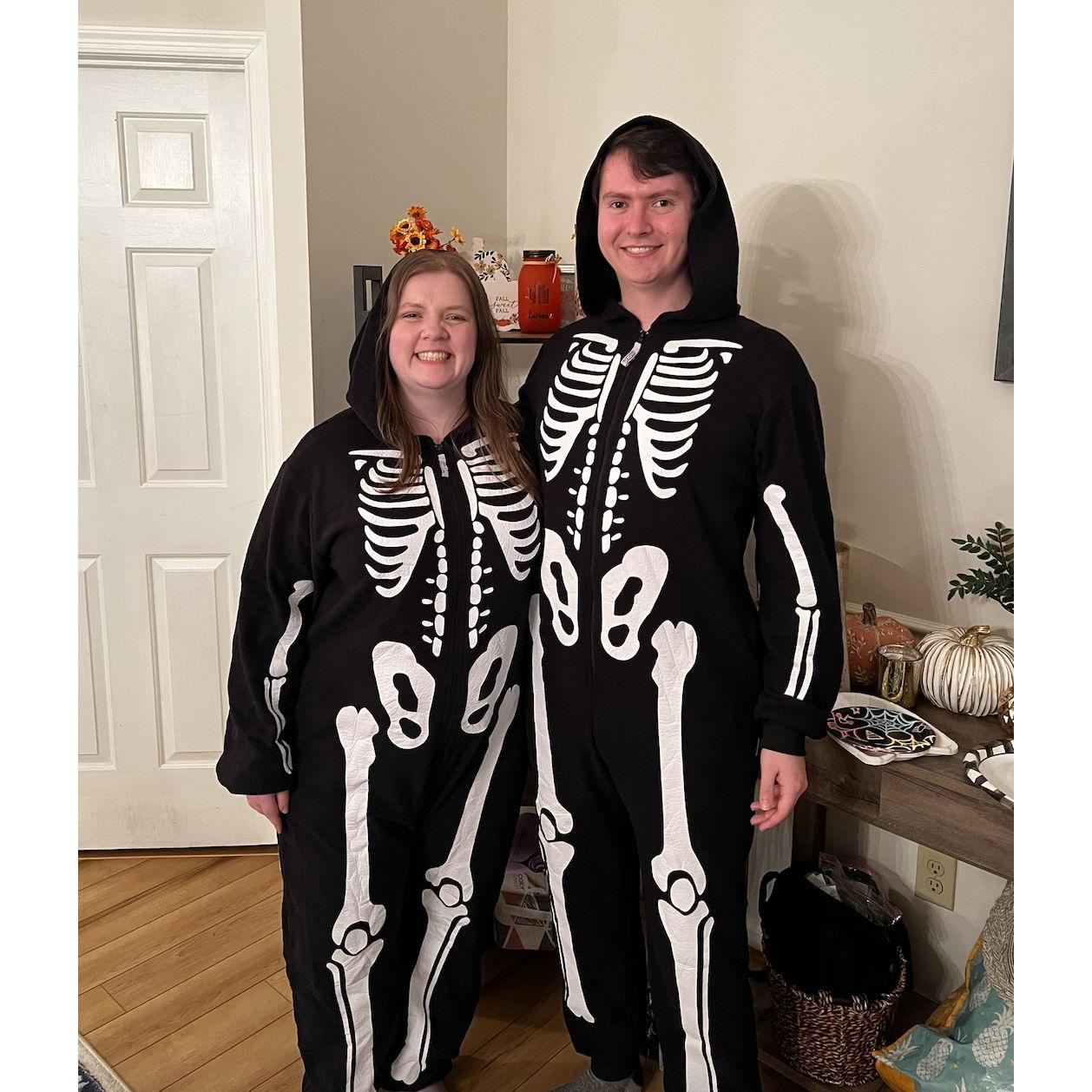 Our halloween costume in onesies as skeletons!