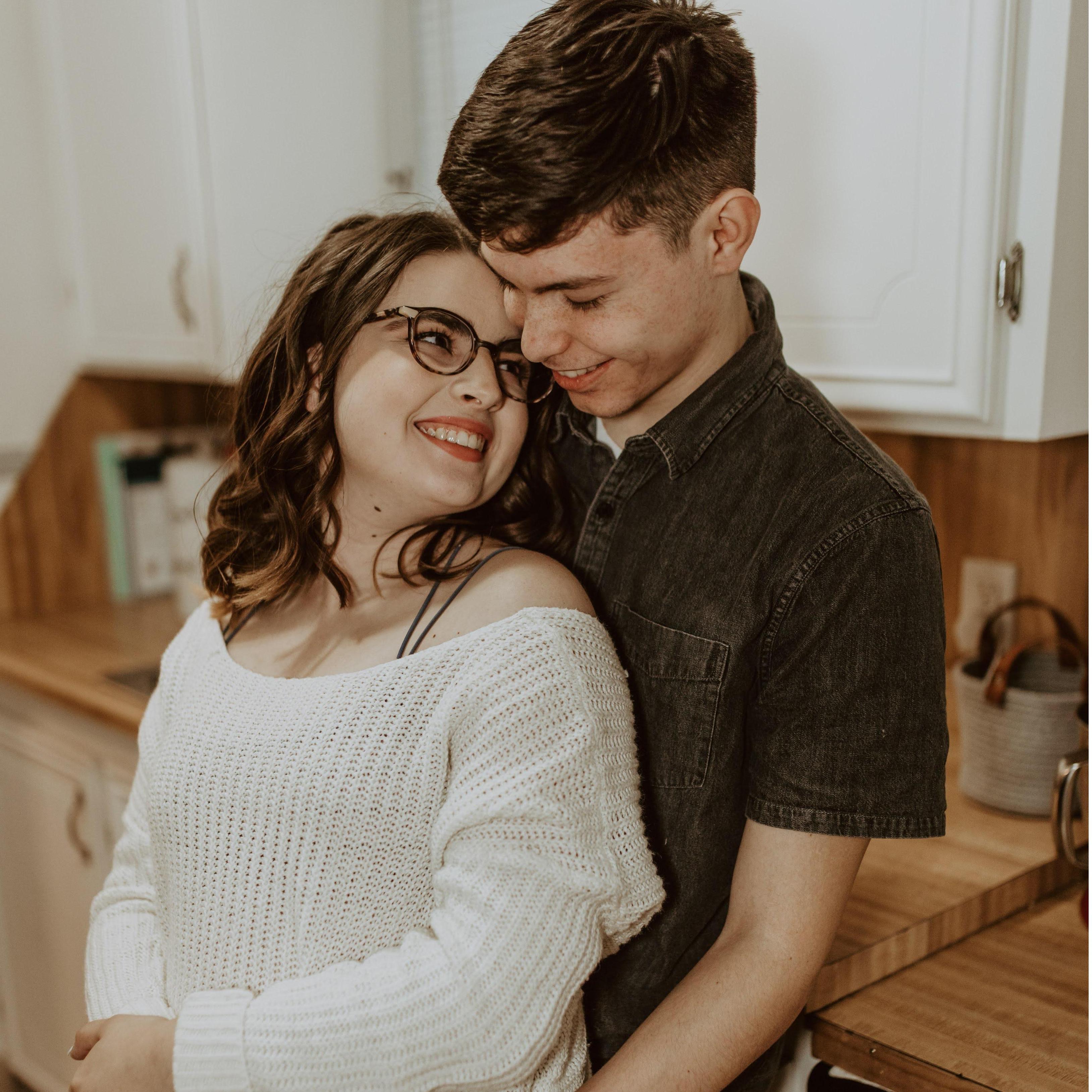 March 2021. The Couple takes their engagement photos! One of the two settings of these images was in their own home!