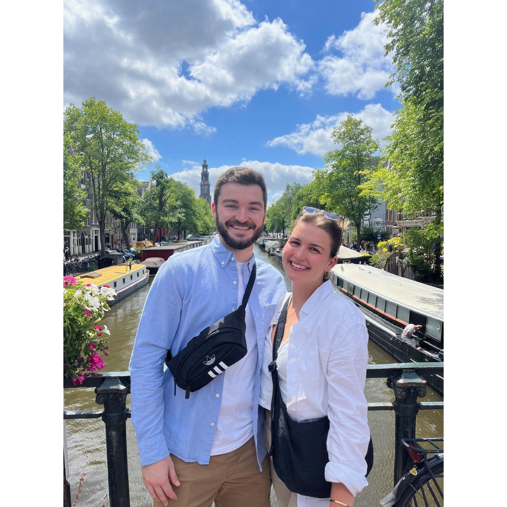 6.20.2022 - Our European vacation! Here we are over the canals of Amsterdam. We also explored the cobblestone streets of Prague, the vibrant art of Barcelona, and the beautiful beaches of Valencia!