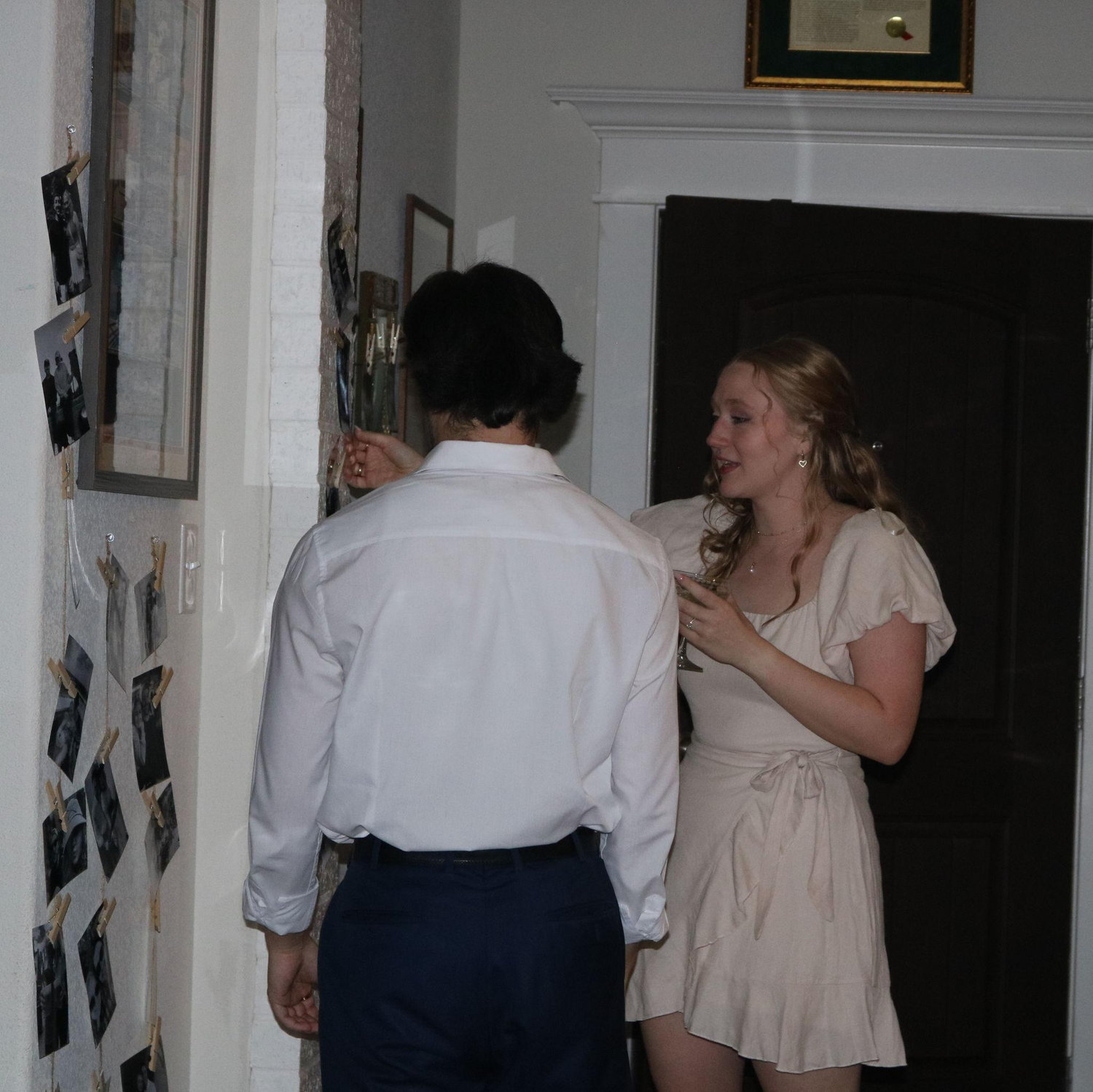 The house was lined with photos of us through the years, rose petals, and candles for the engagement.