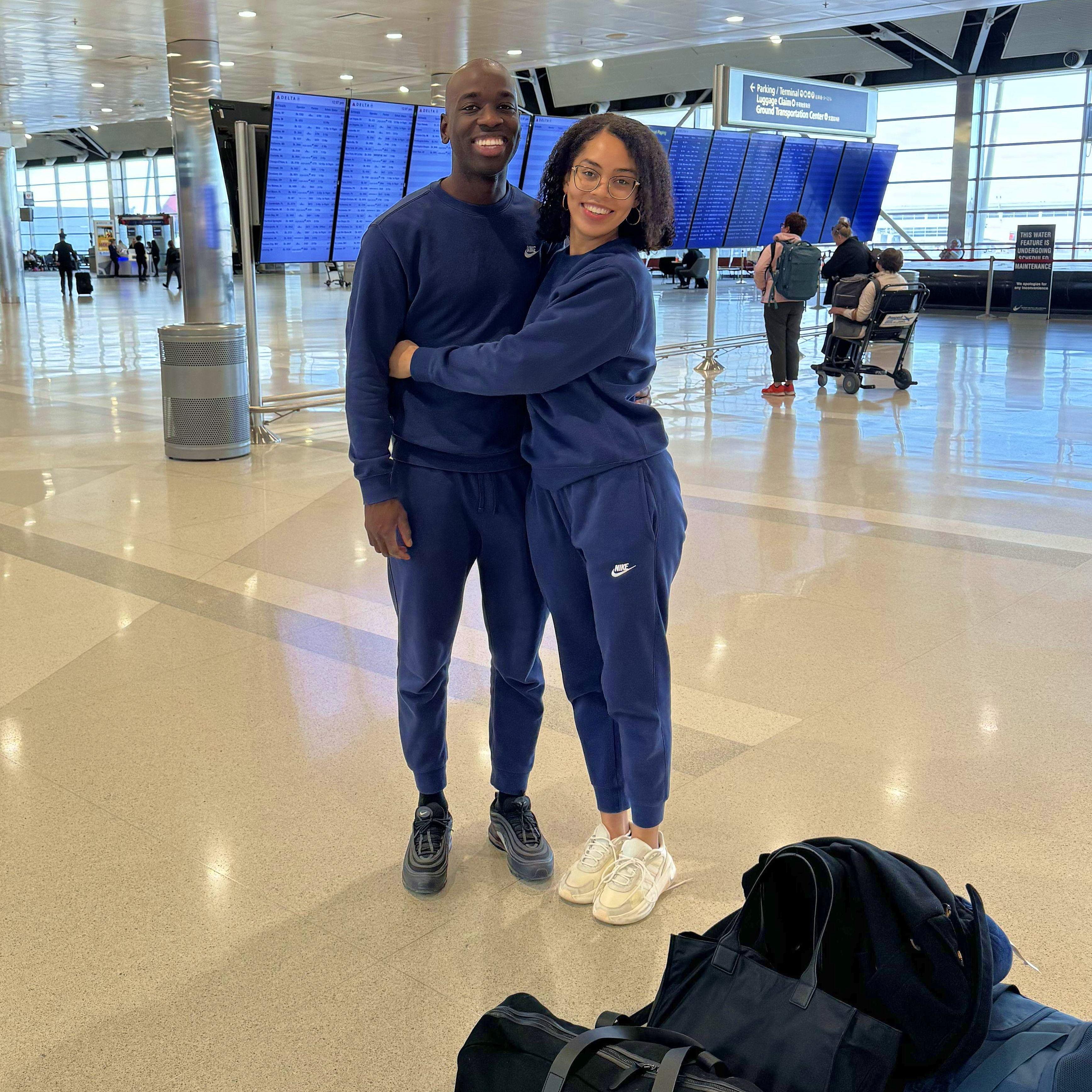 We flew to Michigan for Thanksgiving 2023 in matching Nike suits. Stephanie's family had never seen her in such a casual outfit!