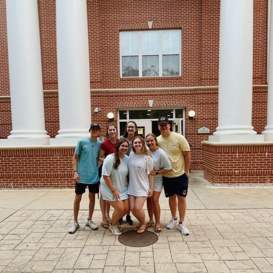 Some of our favorite people in front of Adams Hall where we met freshman year!