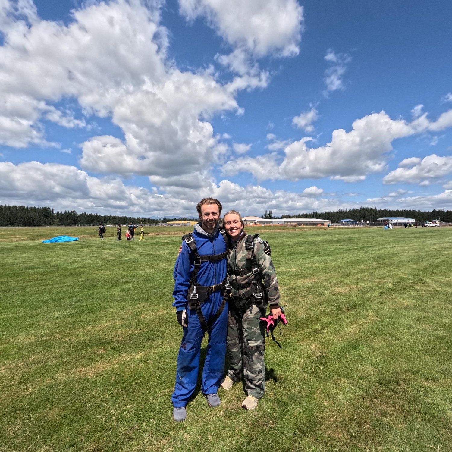 Quite relieved we both made it safely back to earth after our group skydive!
