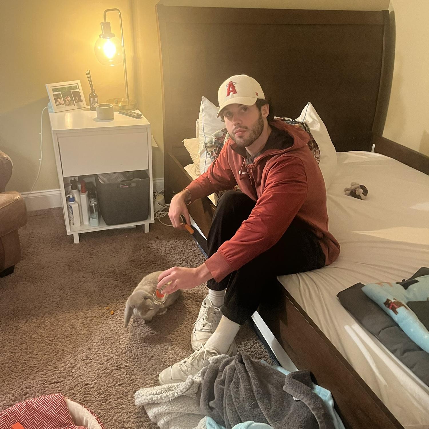 1/2/2024- Photo of Merrick's first time meeting Omelette. We were in MJ's apartment in Cleveland, Tennessee.