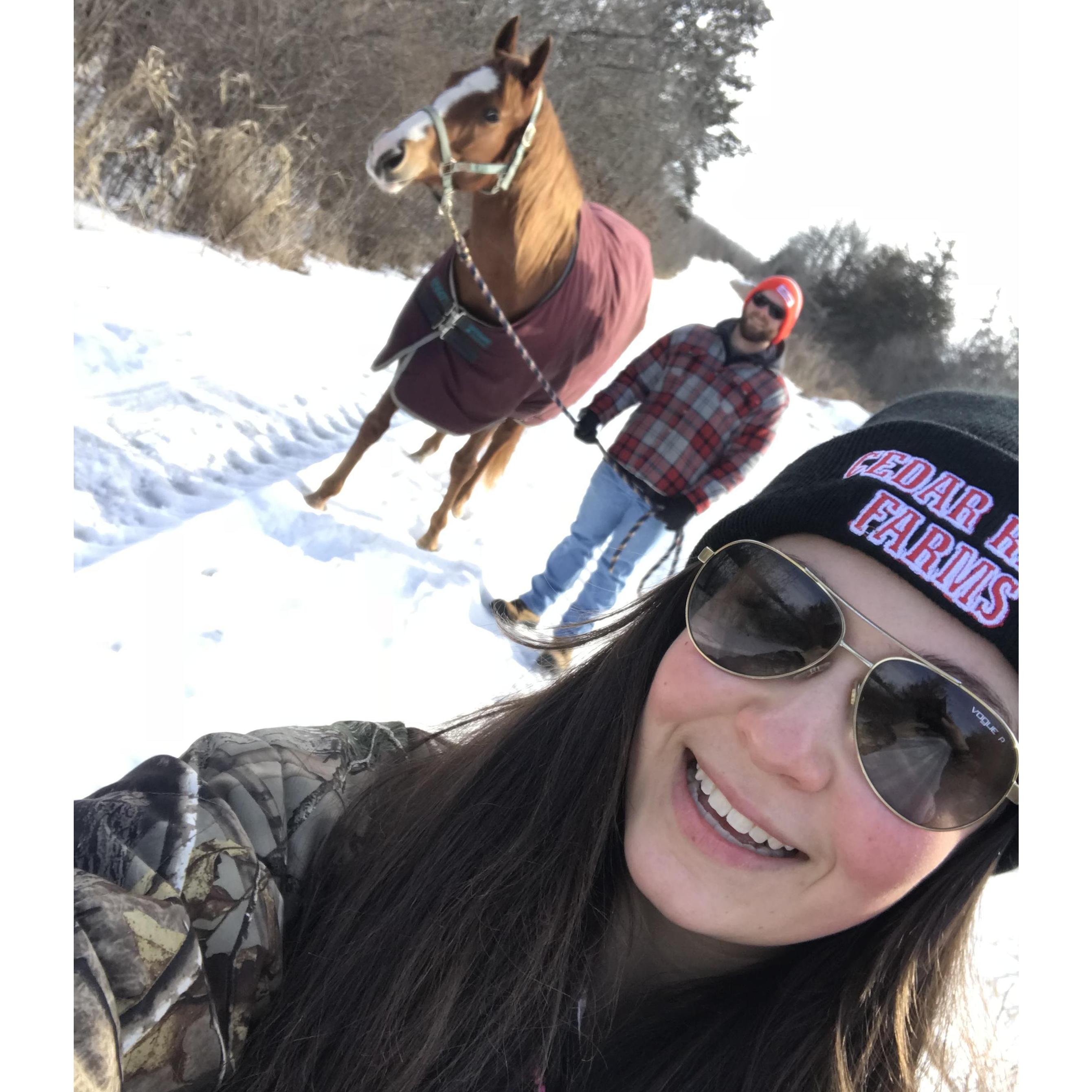 He Holds the horse... She takes the Selfies!