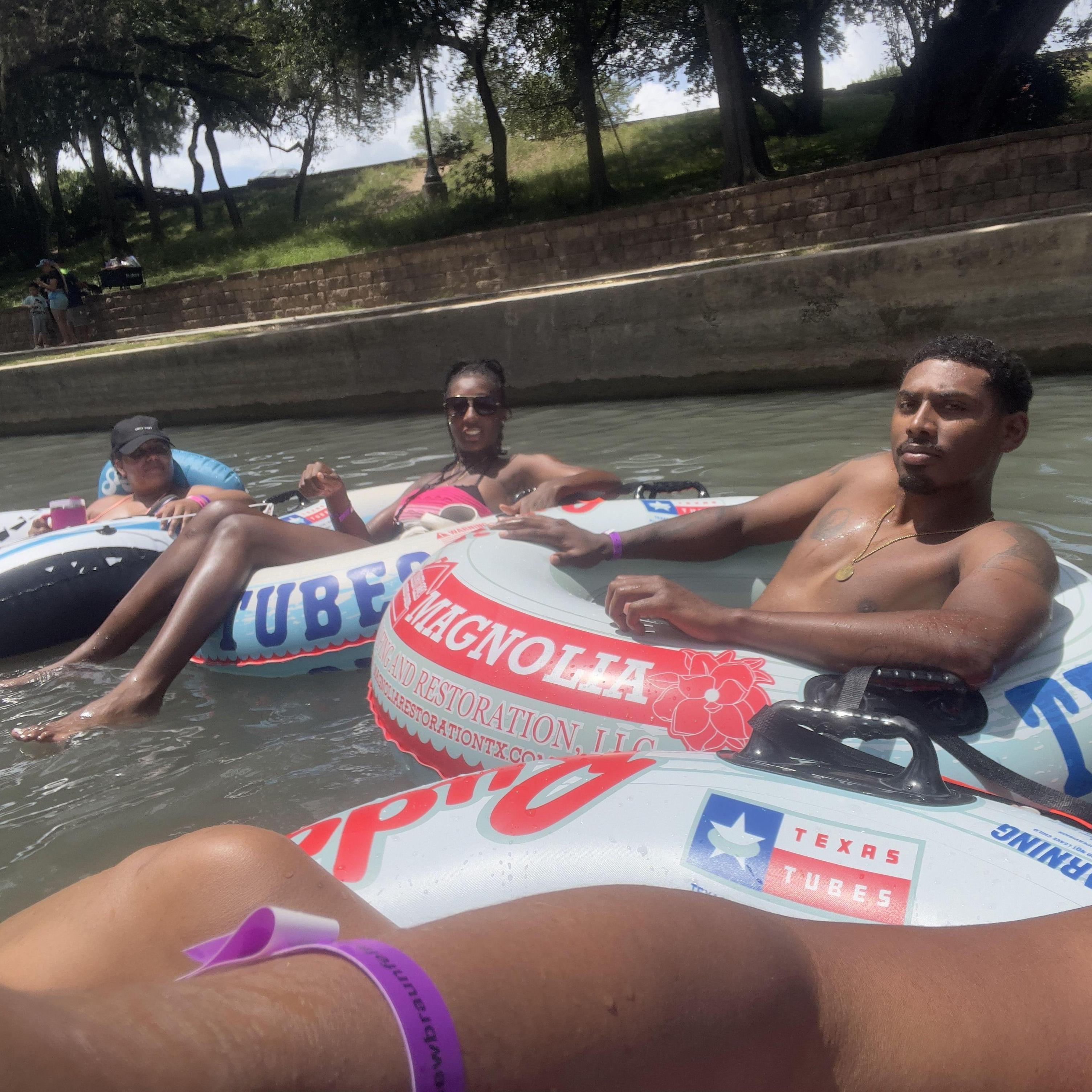 Us tubing in New Braunfels with momma Stephanie and my friend Ortiz.