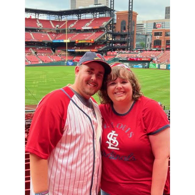 Our first picture together at our first Cardinals game.