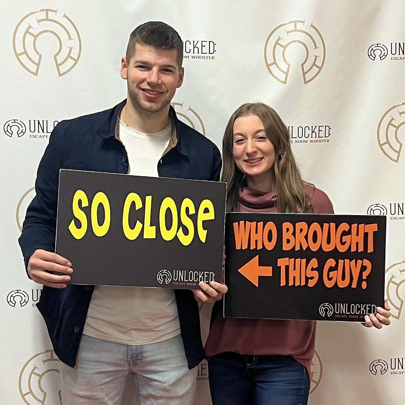 Our first date on December 1st, 2023, and the first picture we've ever taken together. (We failed miserably at this escape room, by the way, but we had a blast!)